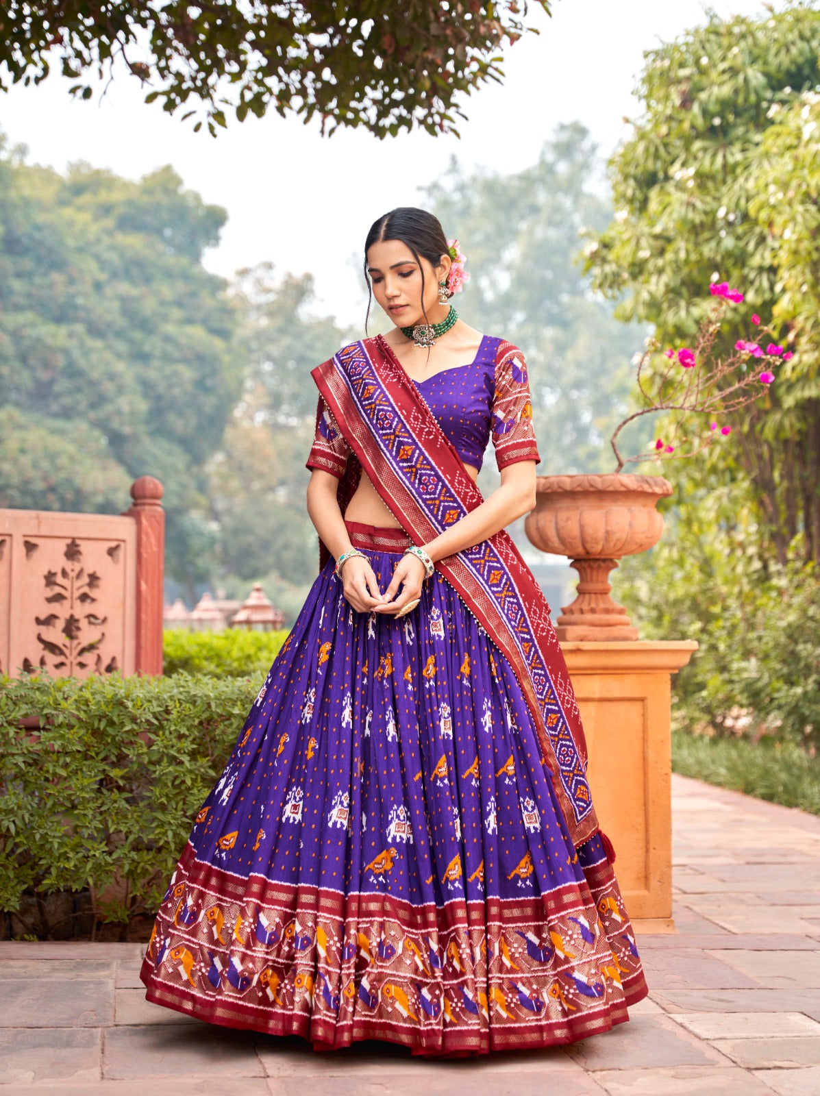 Presenting Patola Print With Foil Work Blue Color Lehenga Choli