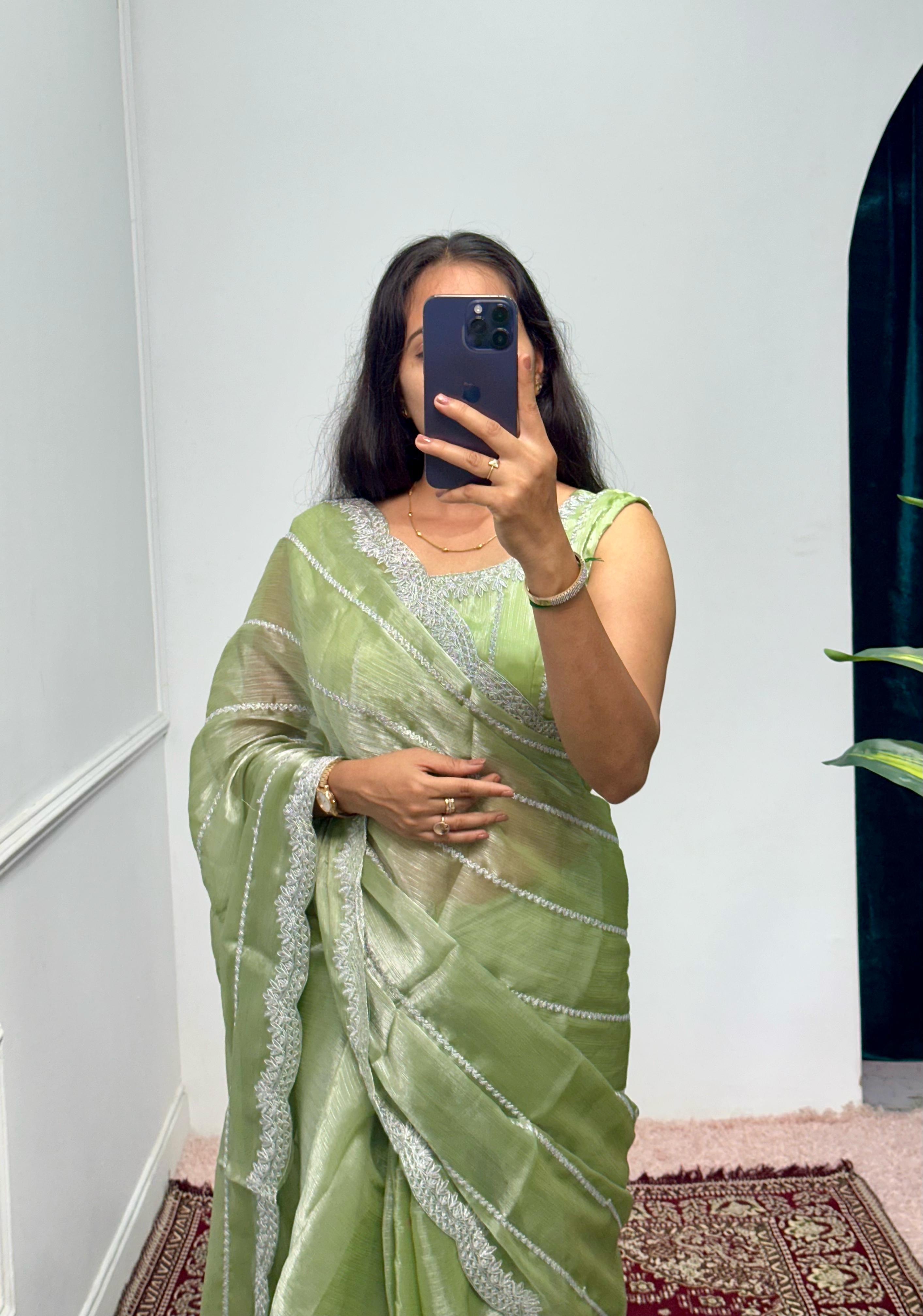 Peaceful Embroidery Zari Work Perrot Color Saree