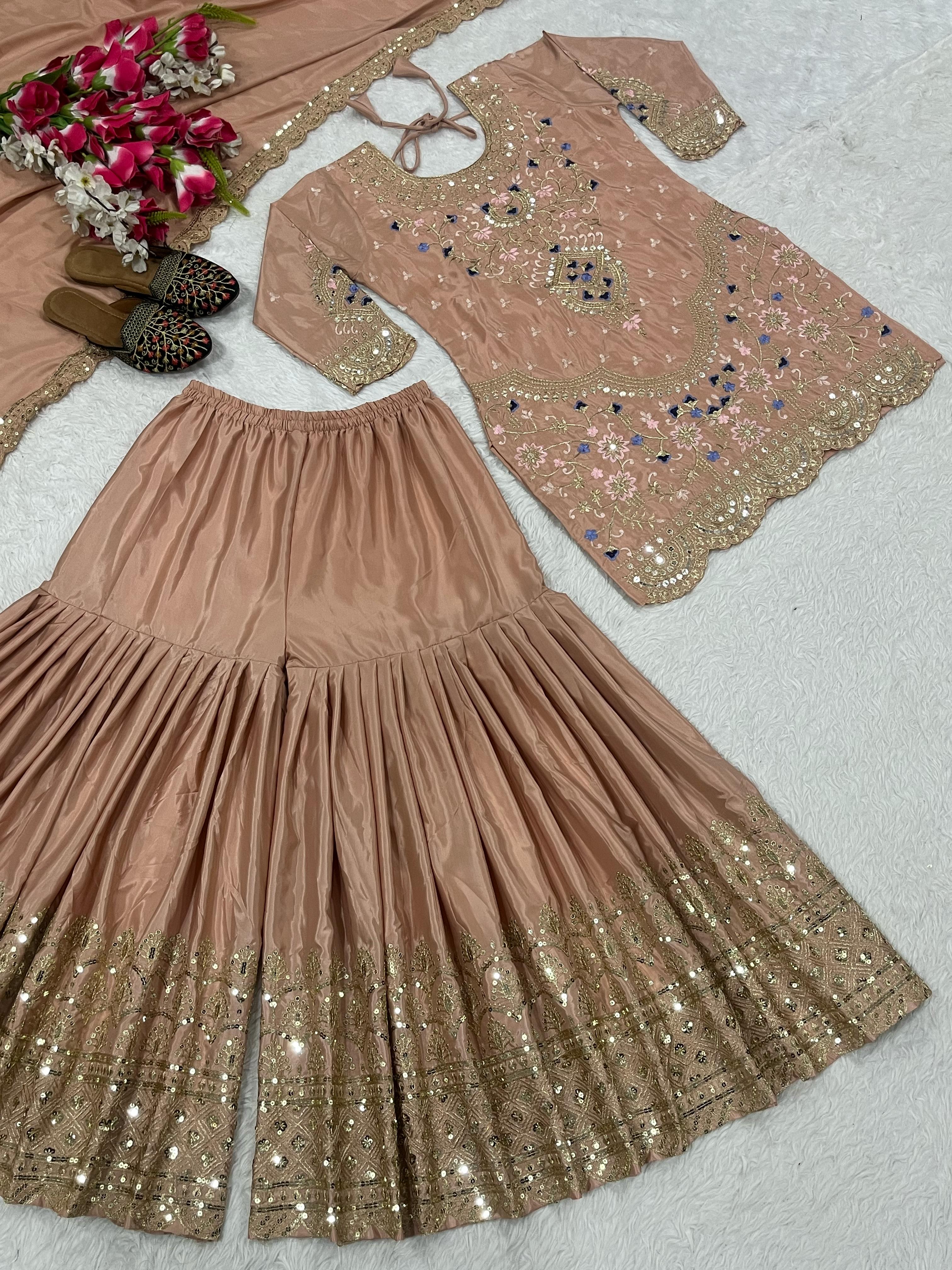 Fabulous Heavy Work Peach Color Sharara Suit