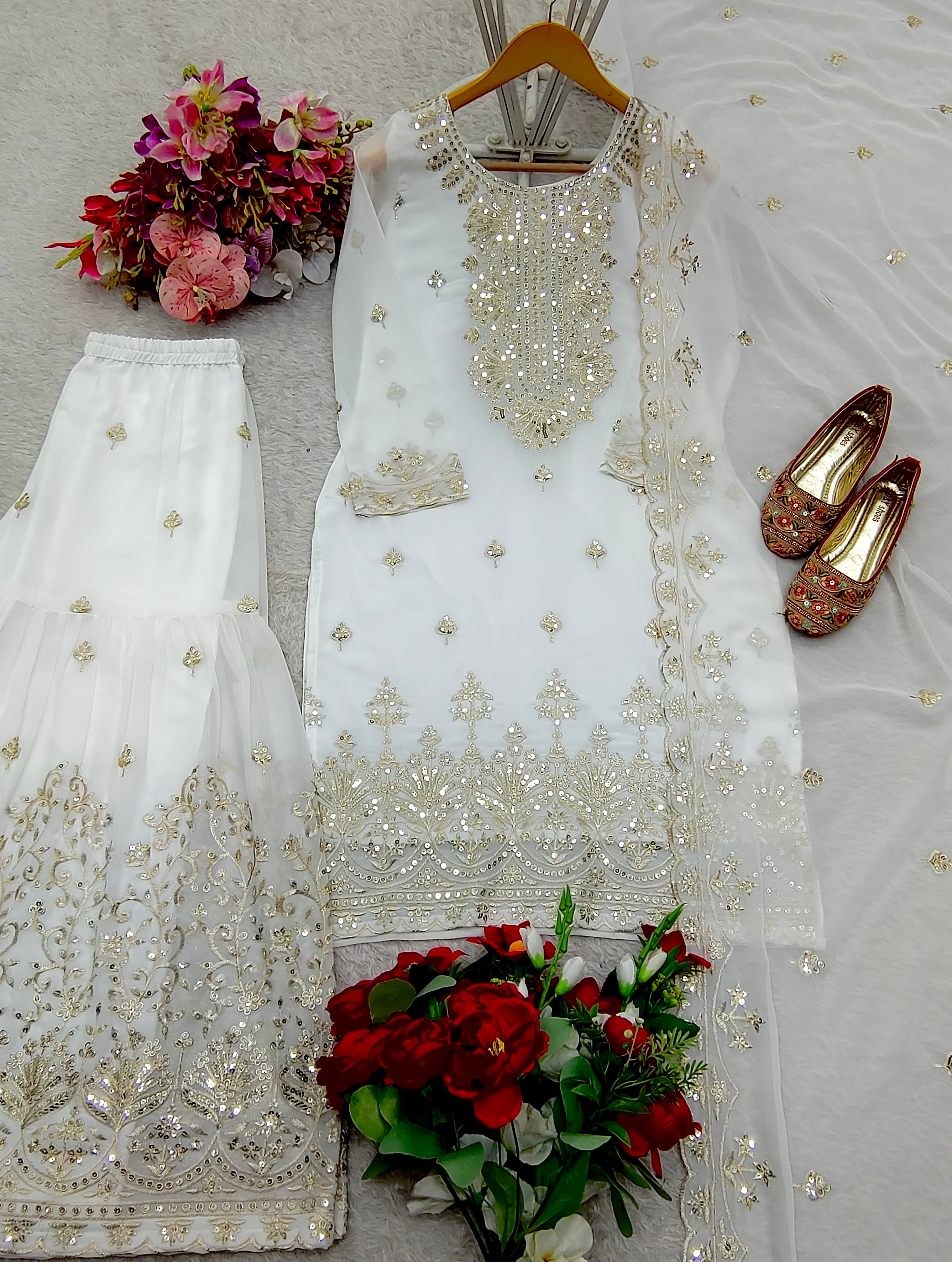 Fabulous Georgette White Color Sharara Suit
