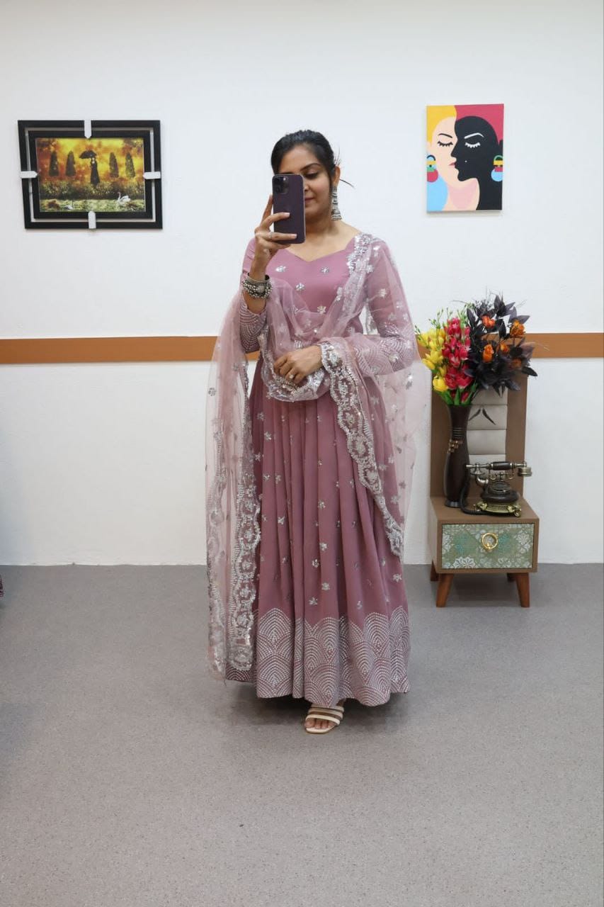 Ravishing Dusty Pink Color Embroidery Work Gown