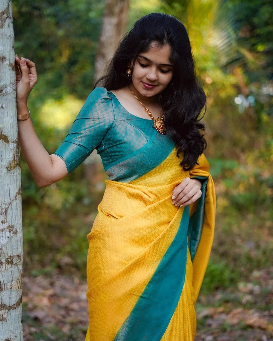 Presenting Yellow Color Saree With Sky Blue Border