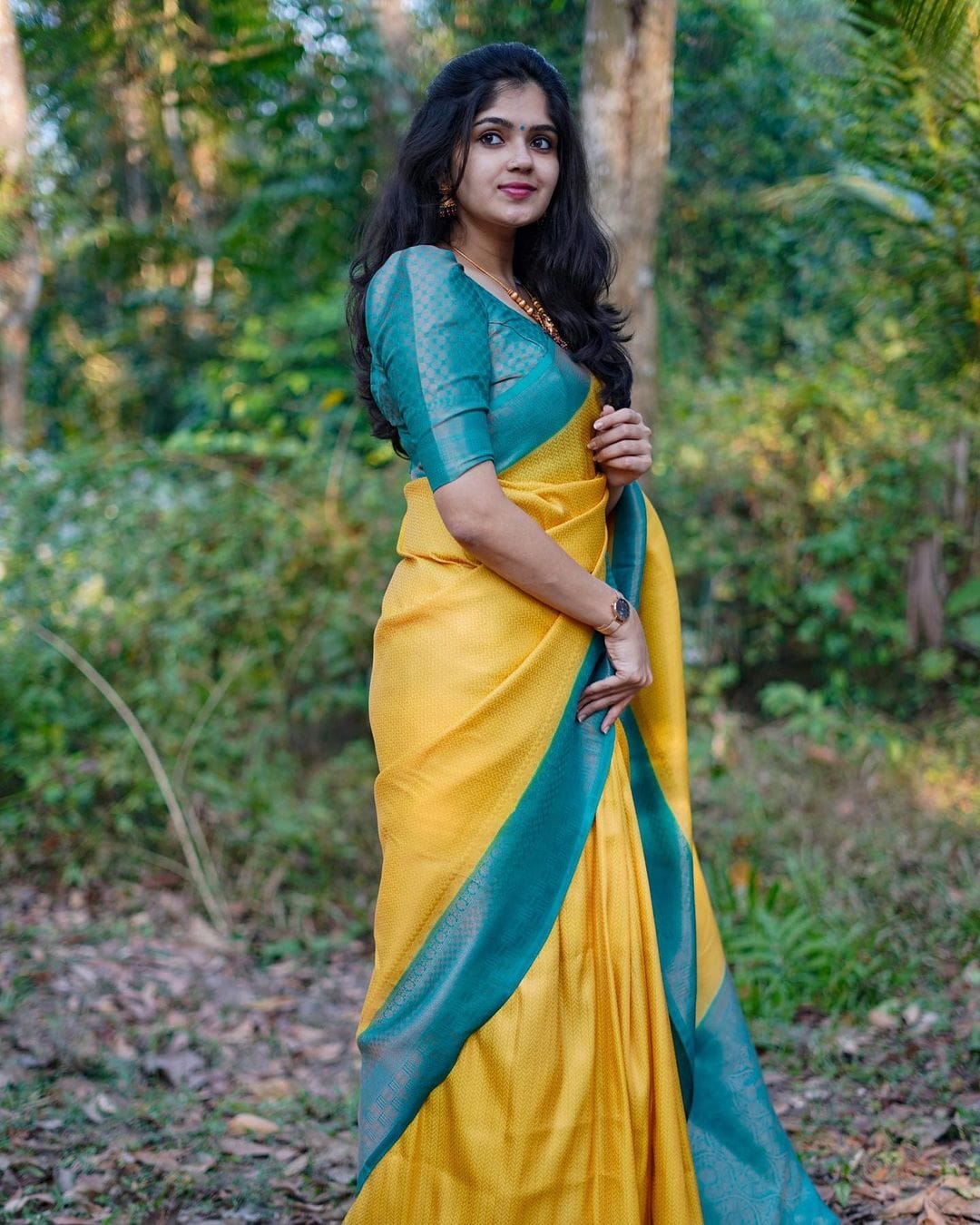 Presenting Yellow Color Saree With Sky Blue Border