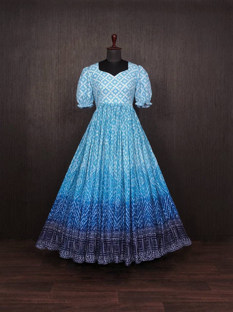 Gorgeous Blue Color Rich Print With Plated Gown