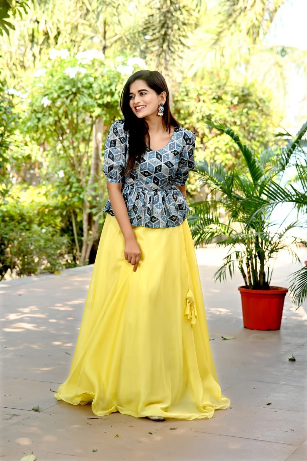 Plain Yellow Color Lehenga With Fancy Pattern Top
