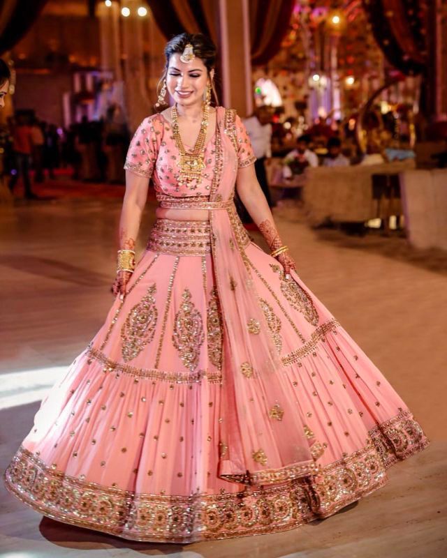 Bridal Wear Peach Color Heavy Embroidered Lehenga Choli