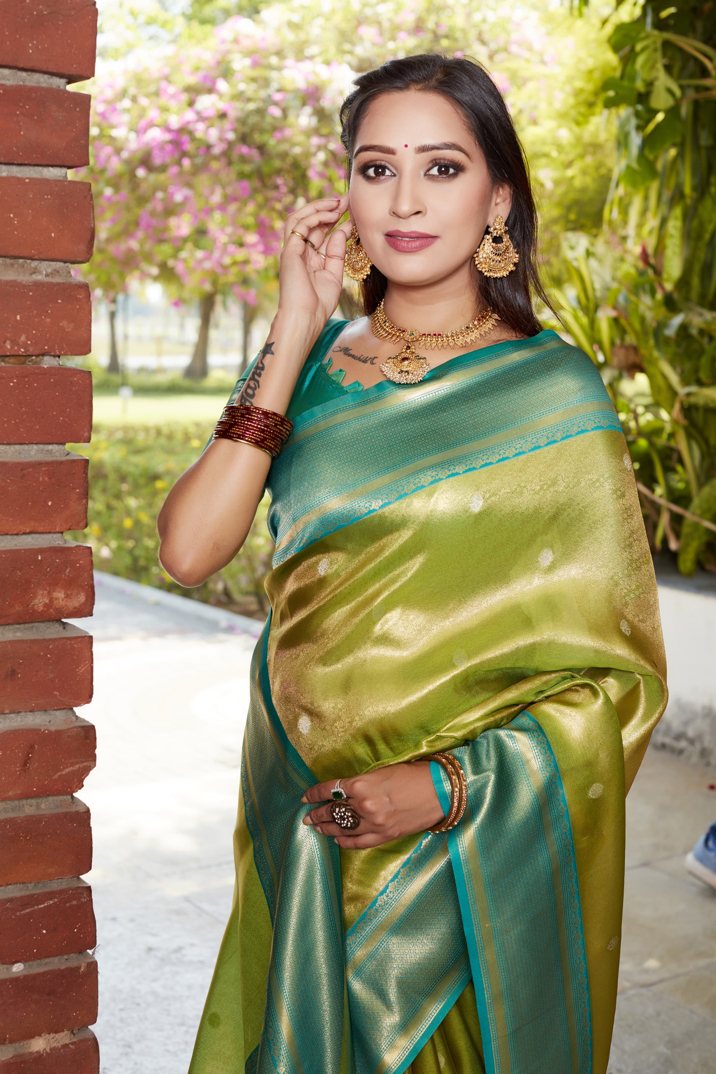 Glorious Tissue Silk Green Color Saree