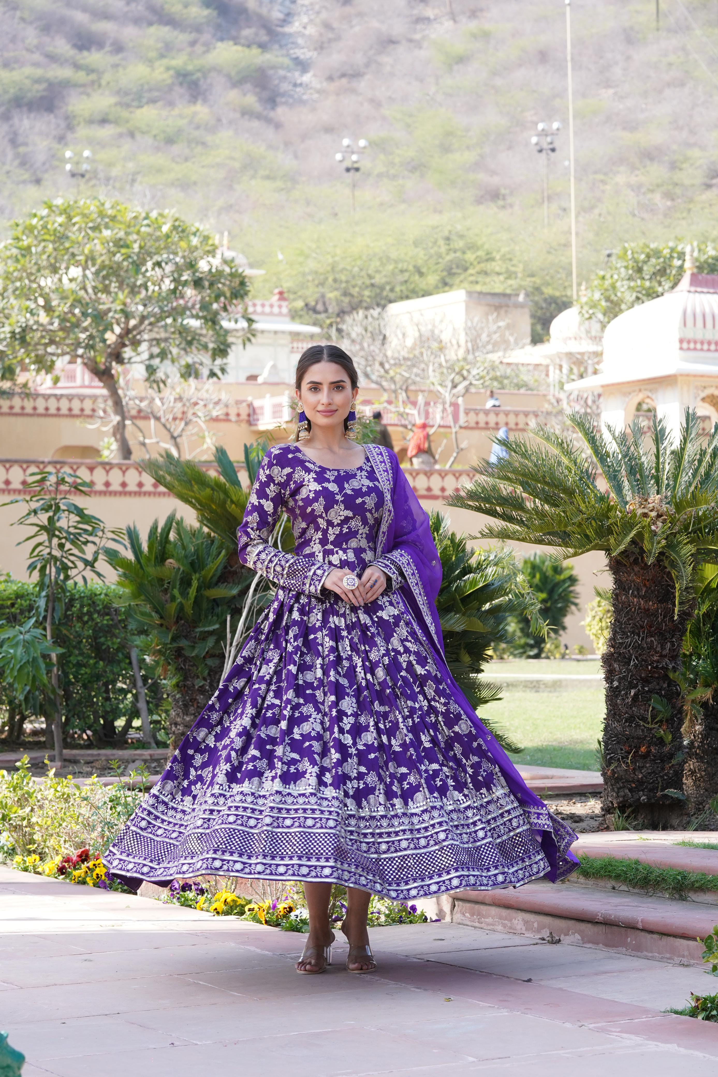 Delightful Sequins Embroidered Work Blue Color Gown