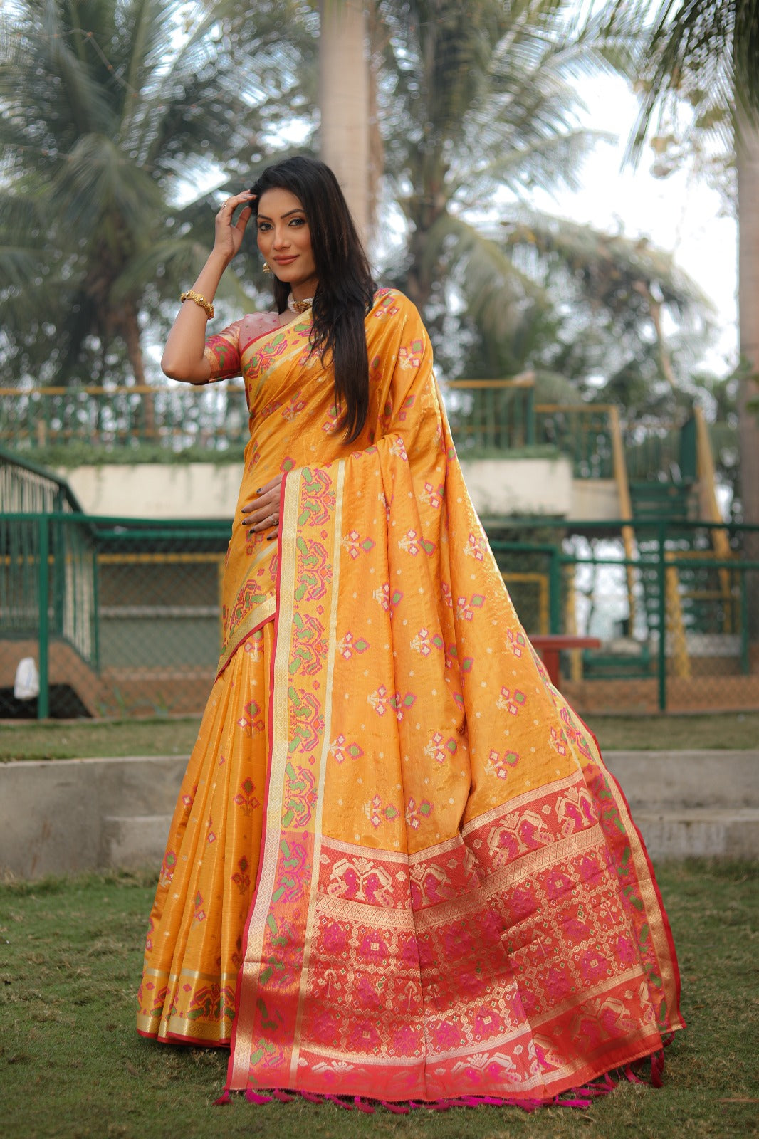 Amazing  Patola Print Yellow Color Organza sarees