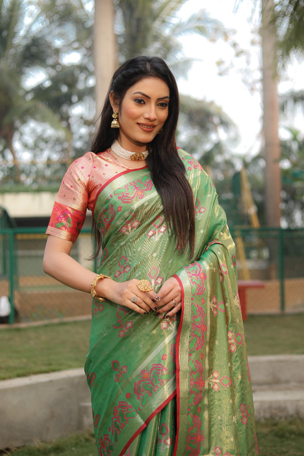 Amazing  Patola Print Green  Color Organza sarees