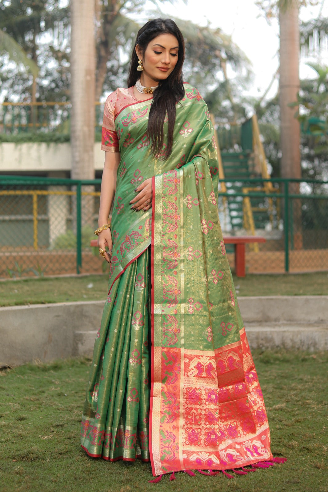 Amazing  Patola Print Green  Color Organza sarees