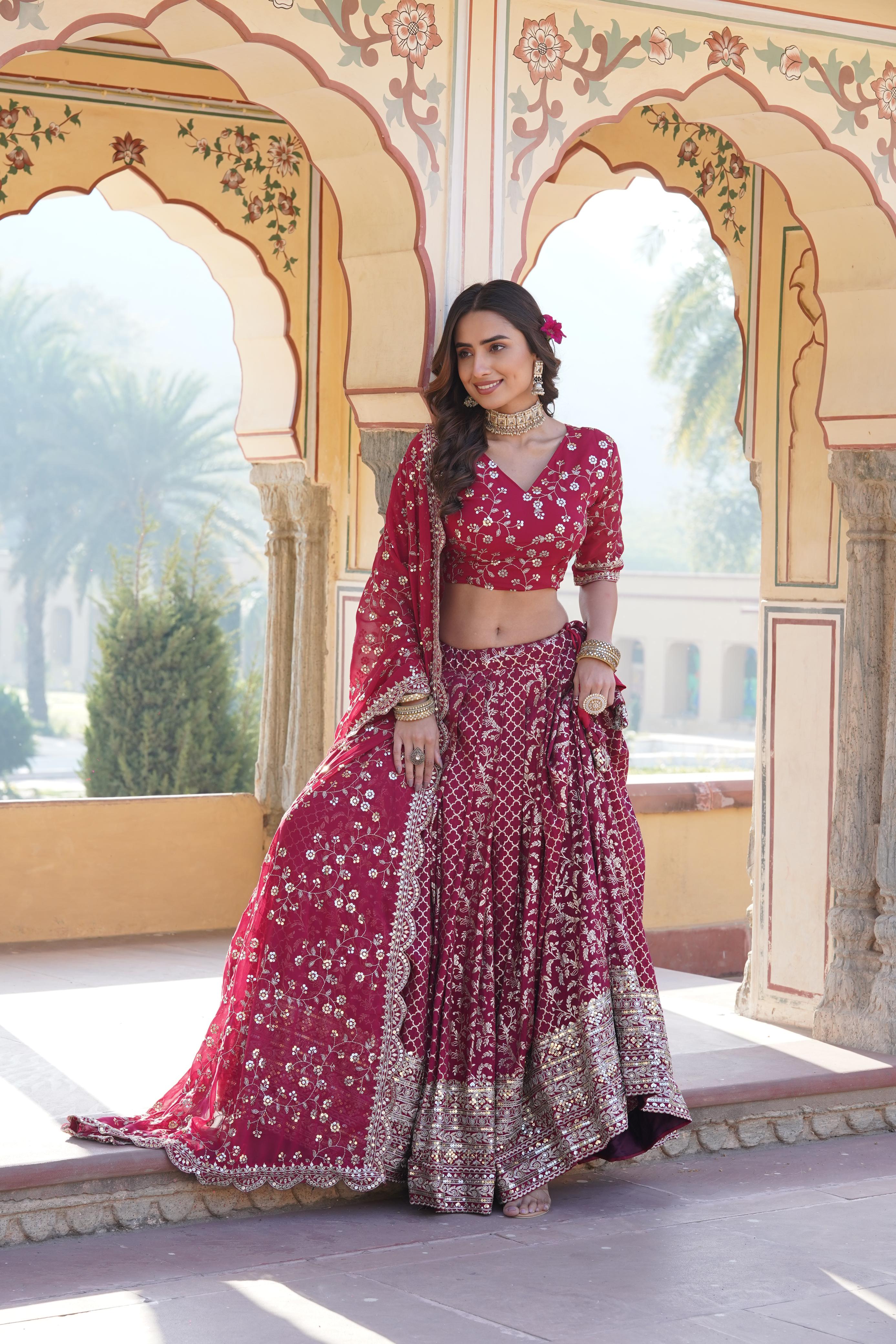 Charming Embroidered Sequins Work Rani Color Lehenga Choli