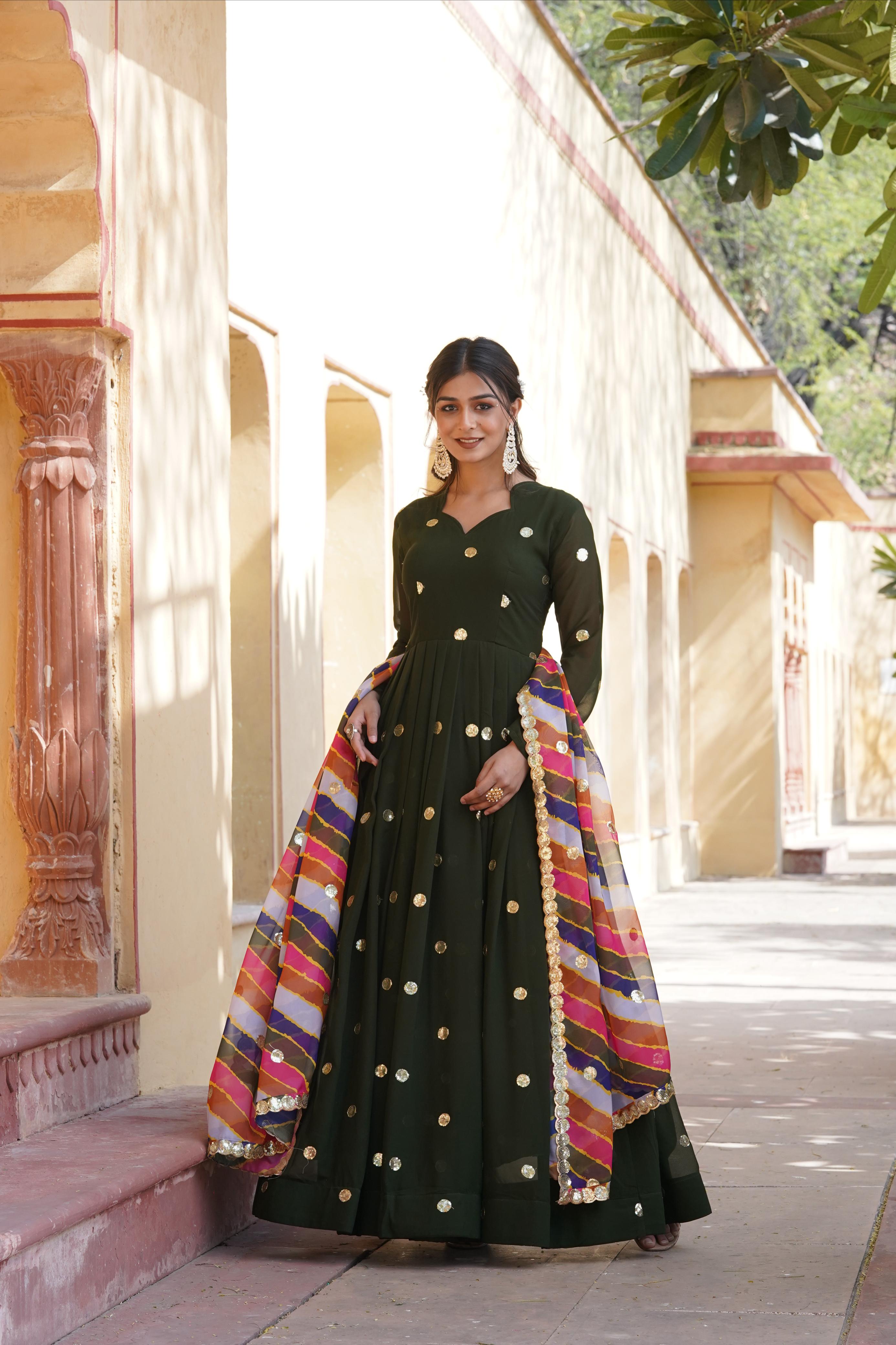 Mesmerizing Sequins Embroidery Green Color Gown