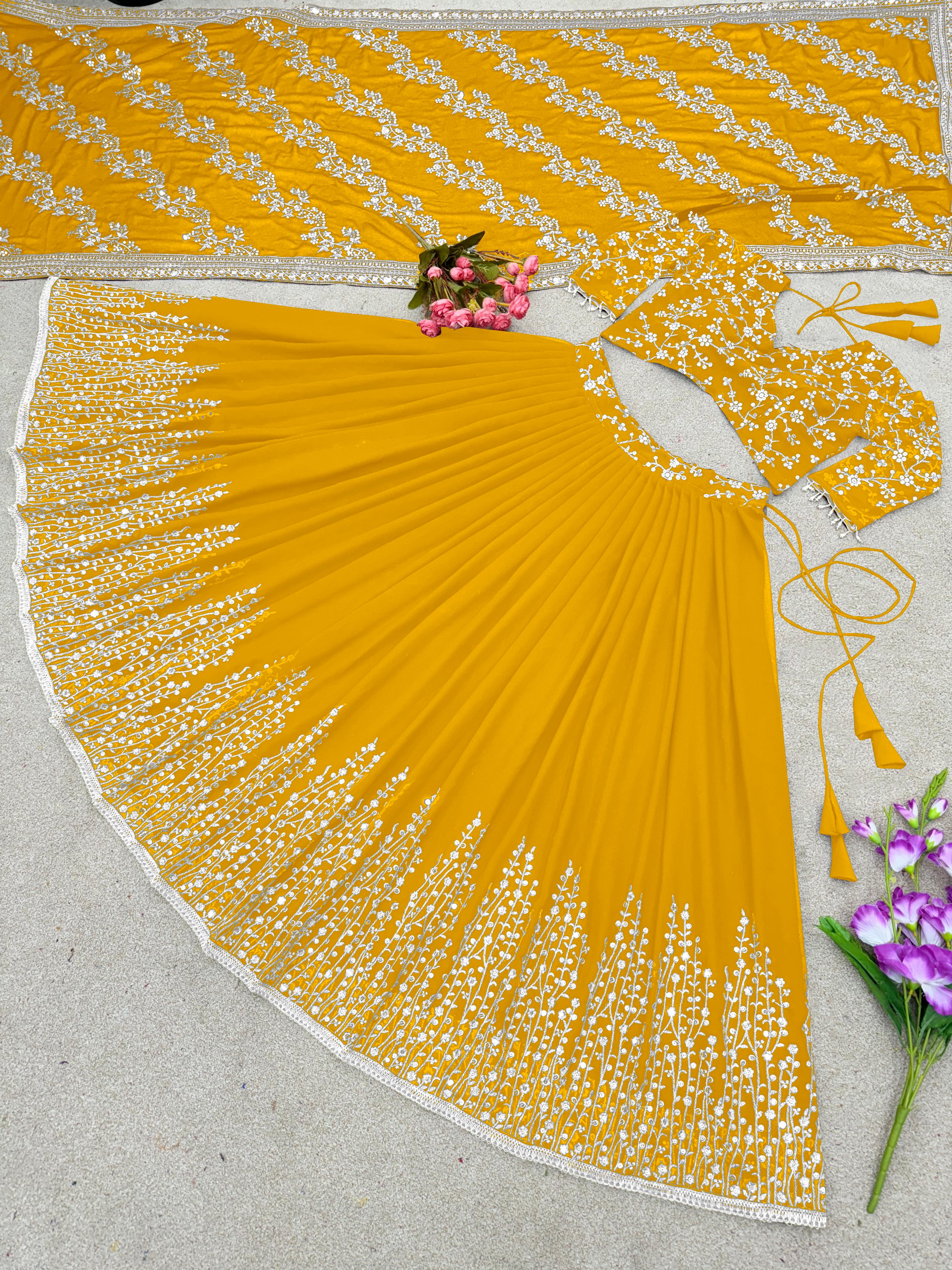 Captivating Embroidery Sequence Work Yellow Color Lehenga Choli