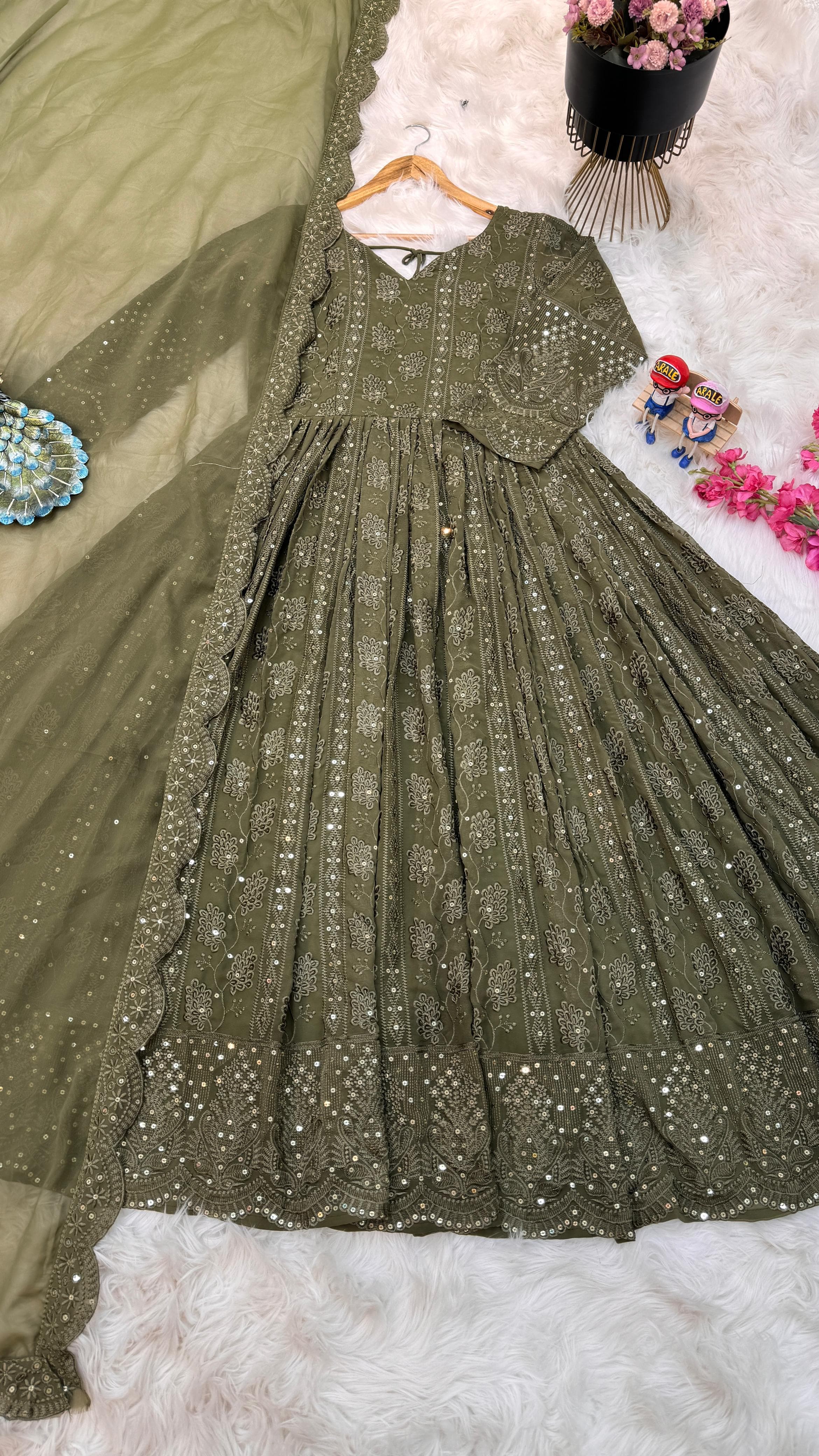 Pretty Sequence Embroidery Work Green Color Gown