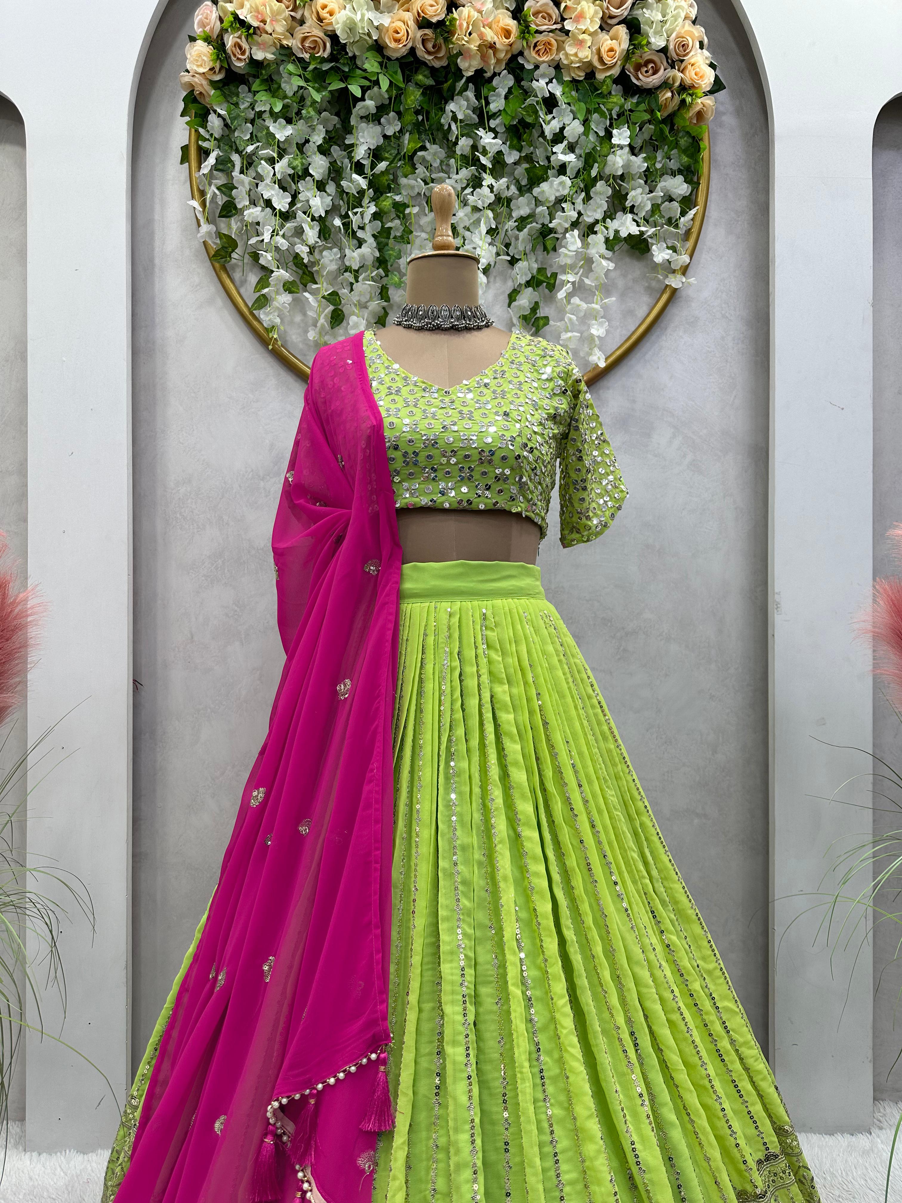 Traditional Wear Parrot Green Lehenga Choli With Pink Dupatta