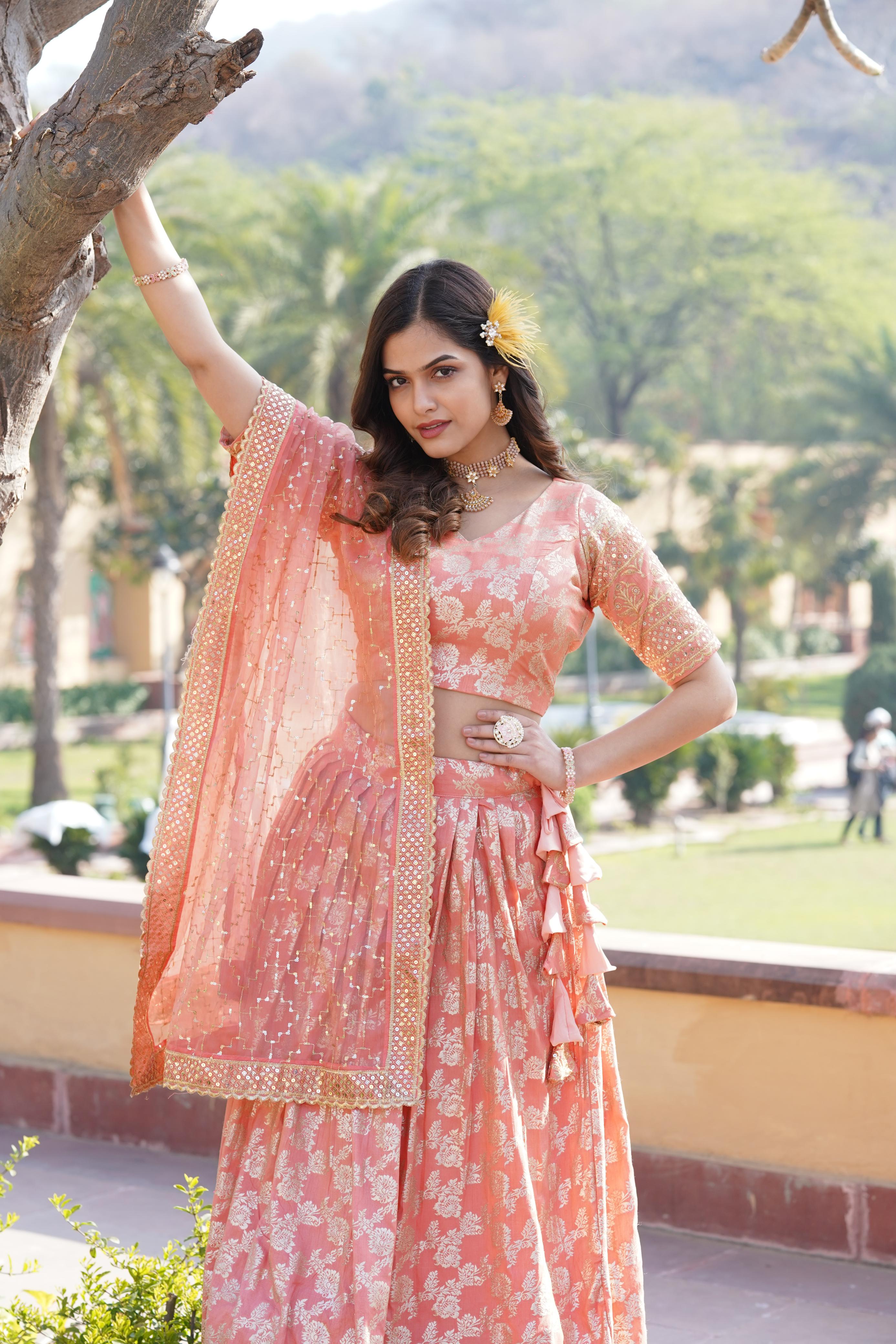 Captivating Sequins Work Peach Color Lehenga Choli