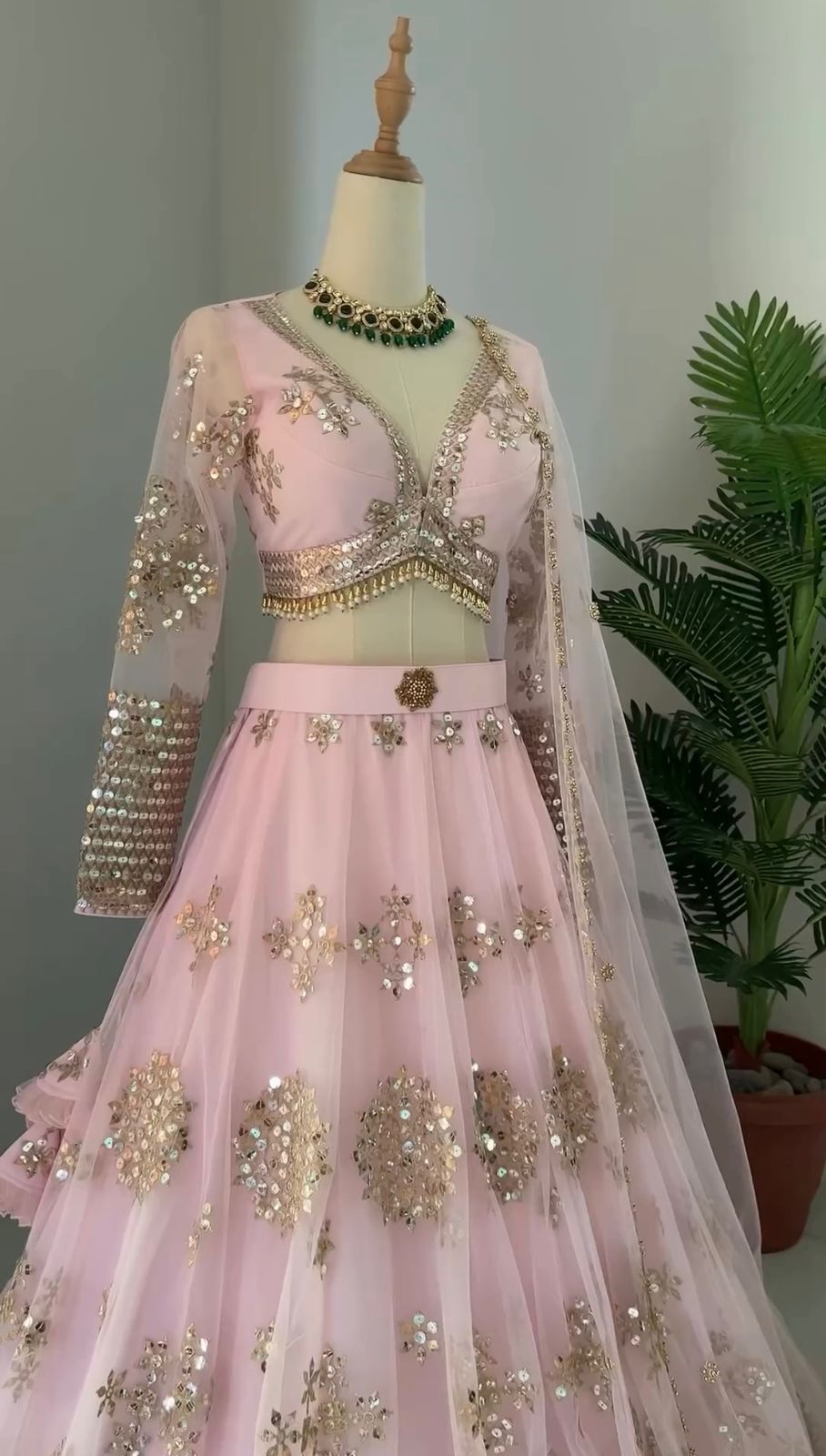 Ravishing Sequence Work Light Pink Net Lehenga Choli