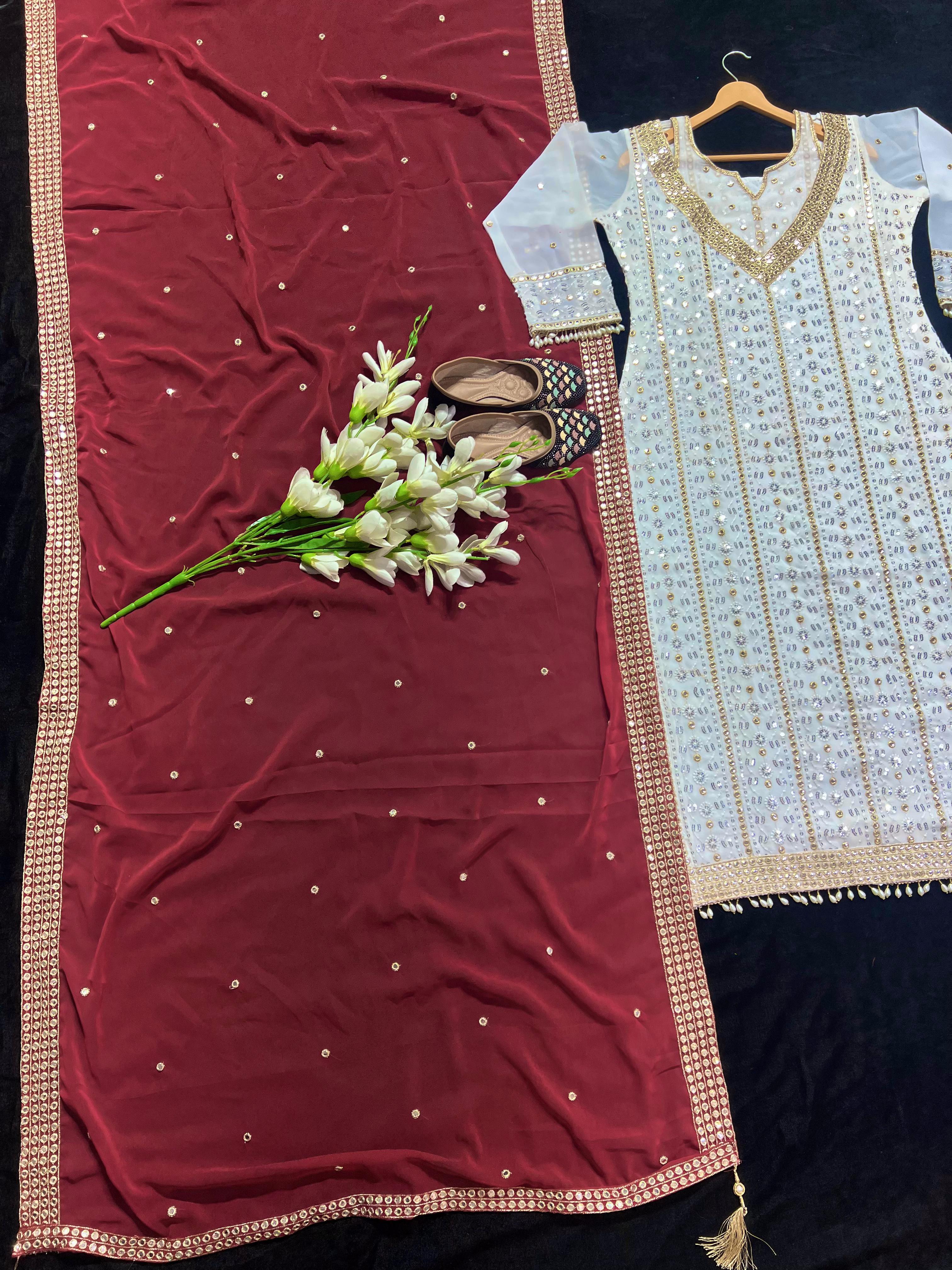 Terrific Embroidered Maroon Salwar Suit With Pink Dupatta