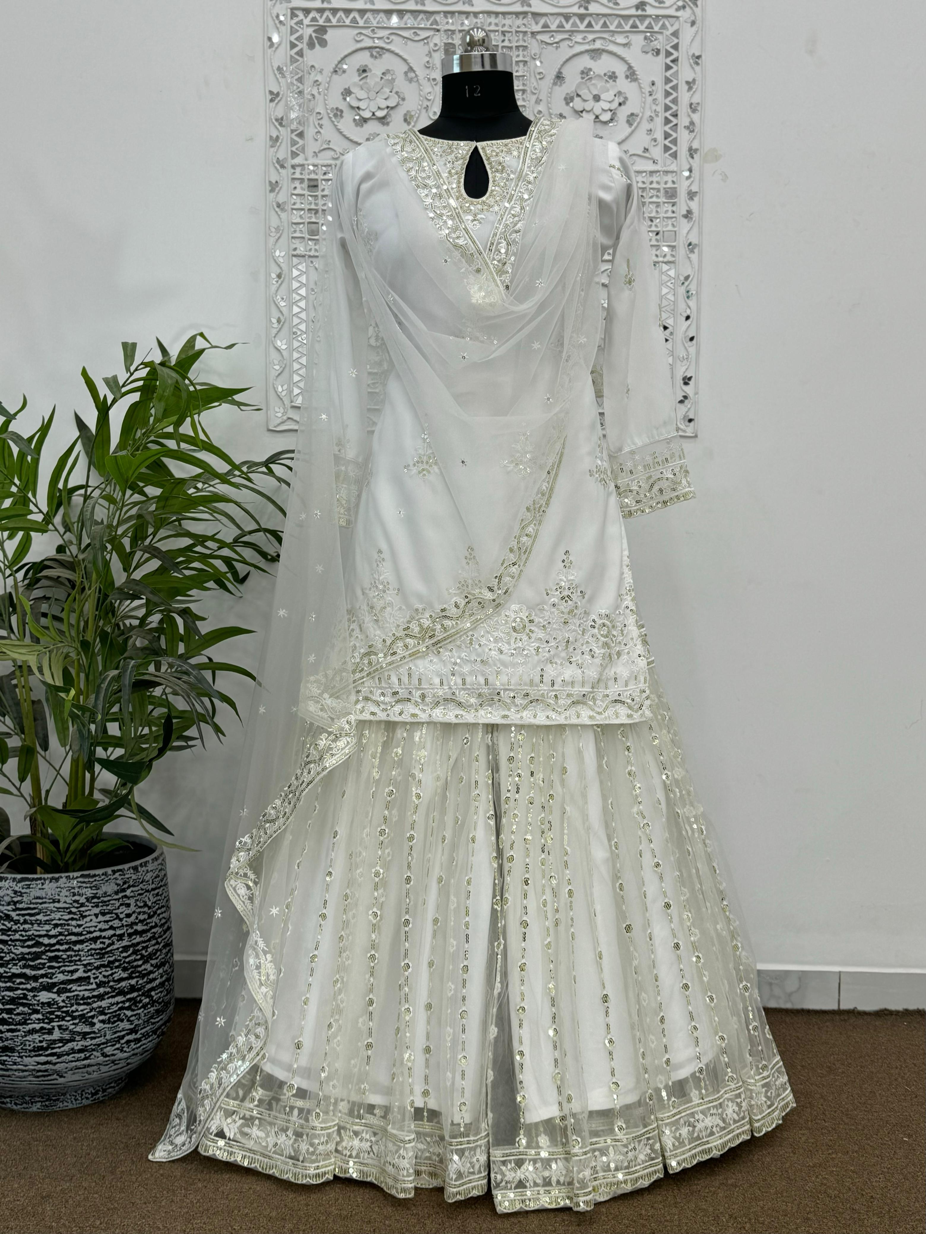 Outstanding  Sequins Work White Color Sharara Suit