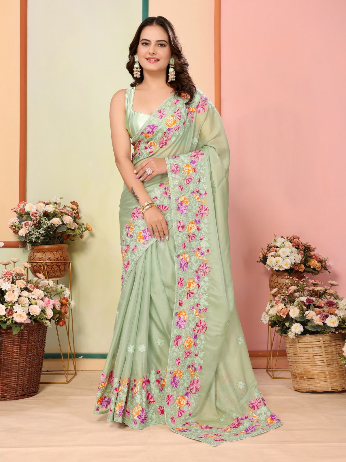 Trendy Embroidery Work Pista Color Organza Saree