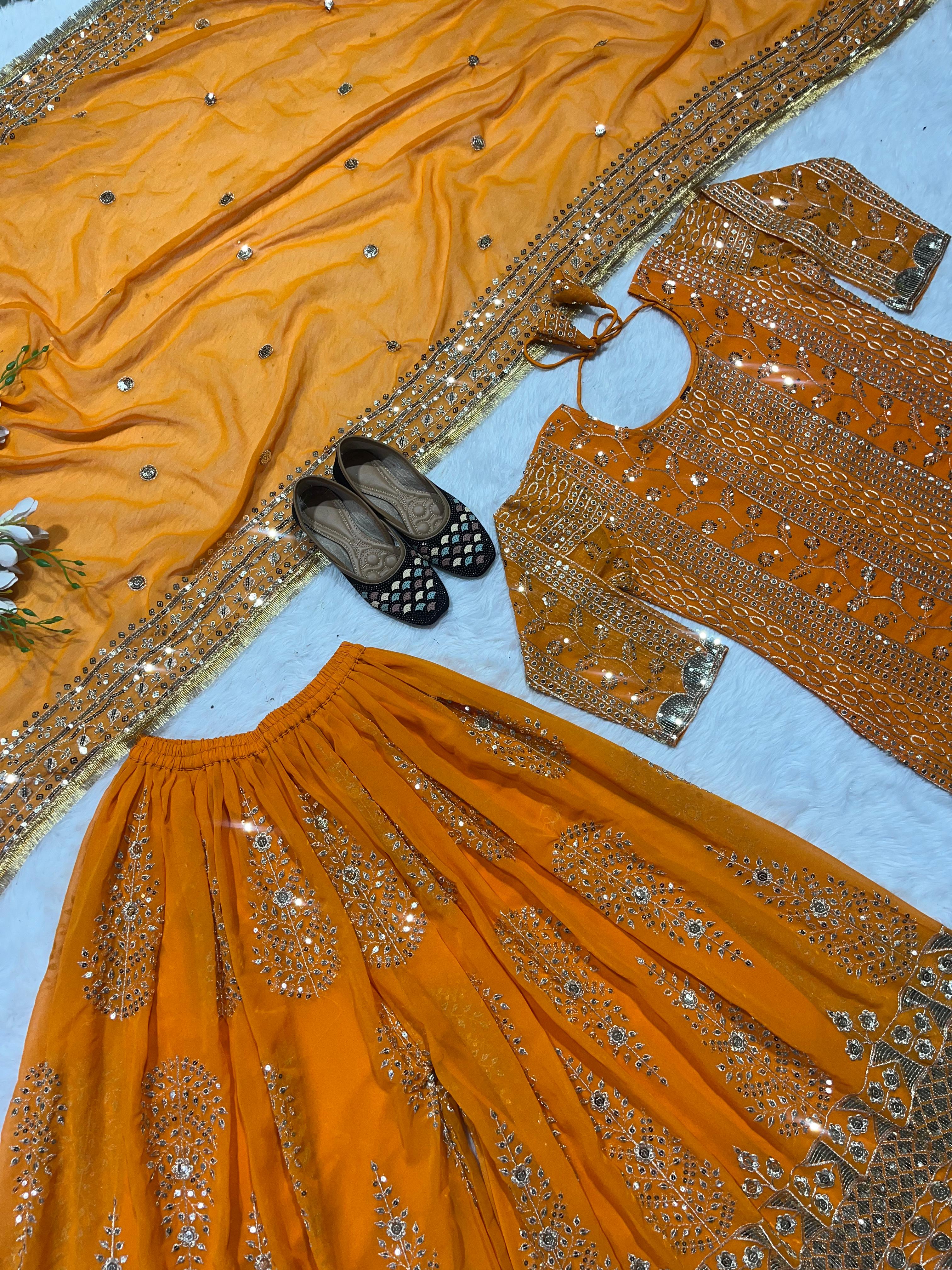 Eyes Catching Georgette Embroidery Work Orange Color Sharara Suit
