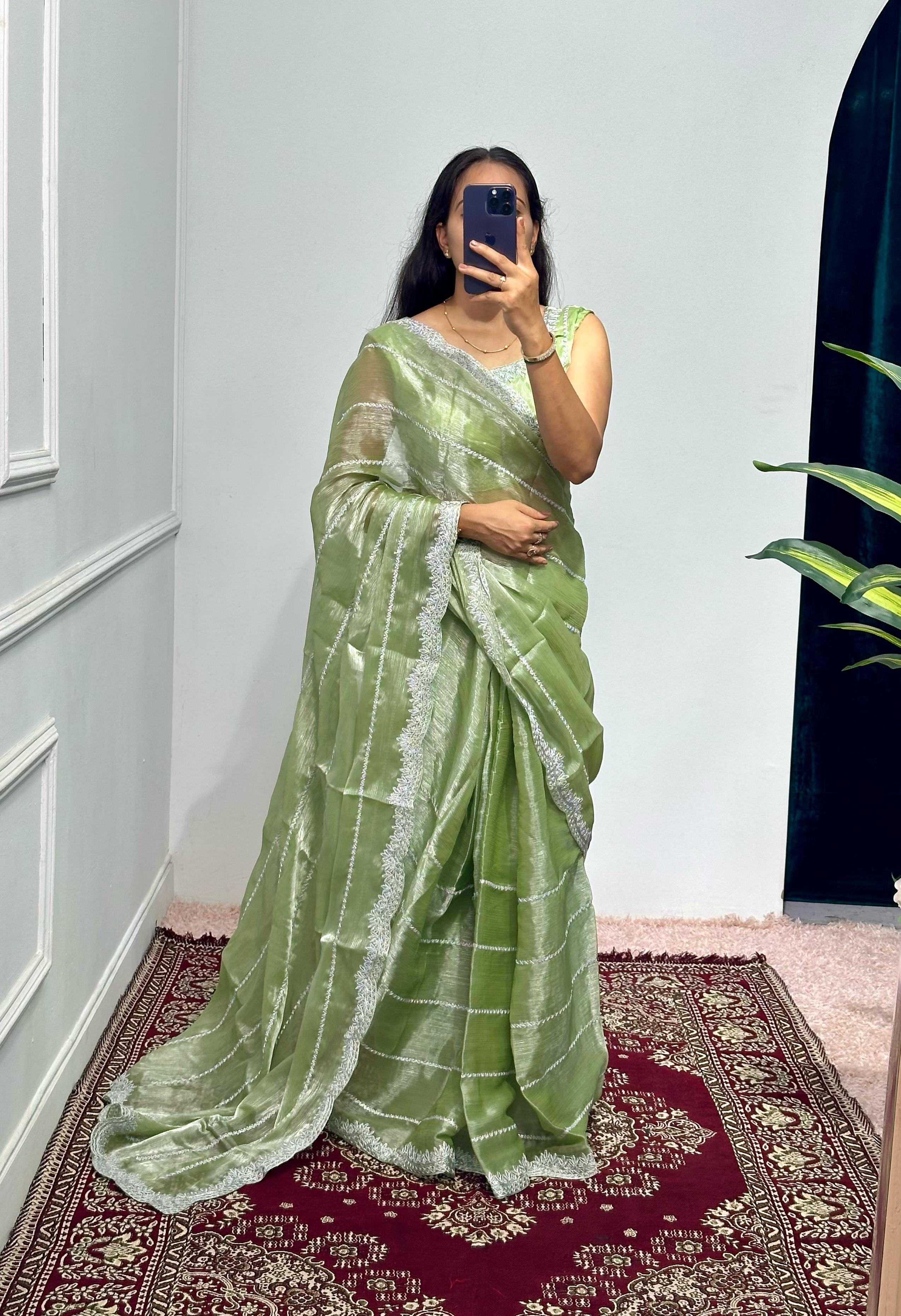 Peaceful Embroidery Zari Work Perrot Color Saree