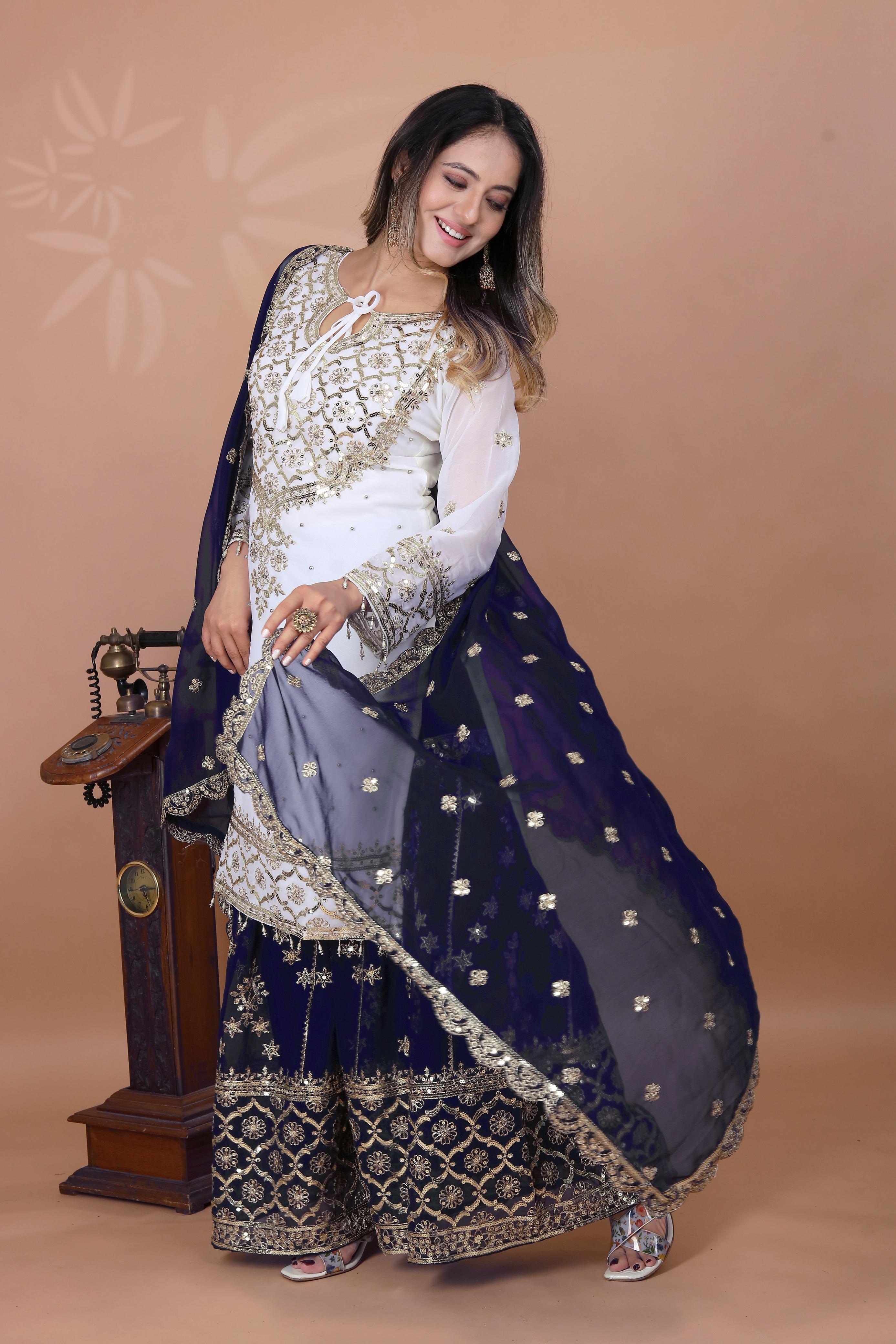 Fabulous Heavy Work White Color Suit With Navy Blue Sharara