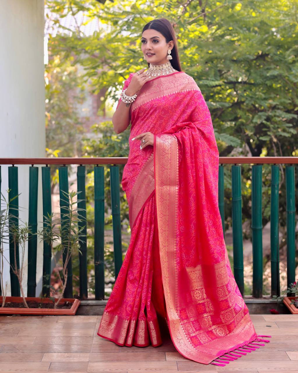 Bandhej Designed Zari Patola Weaving Pink Saree