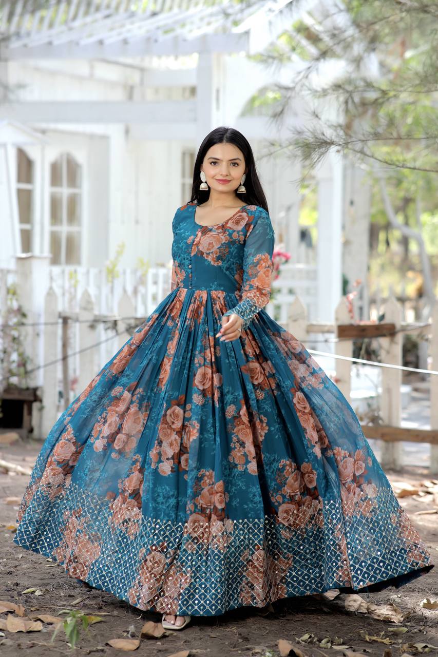 Graceful Embroidery Work With Printed Teal Blue Color Gown
