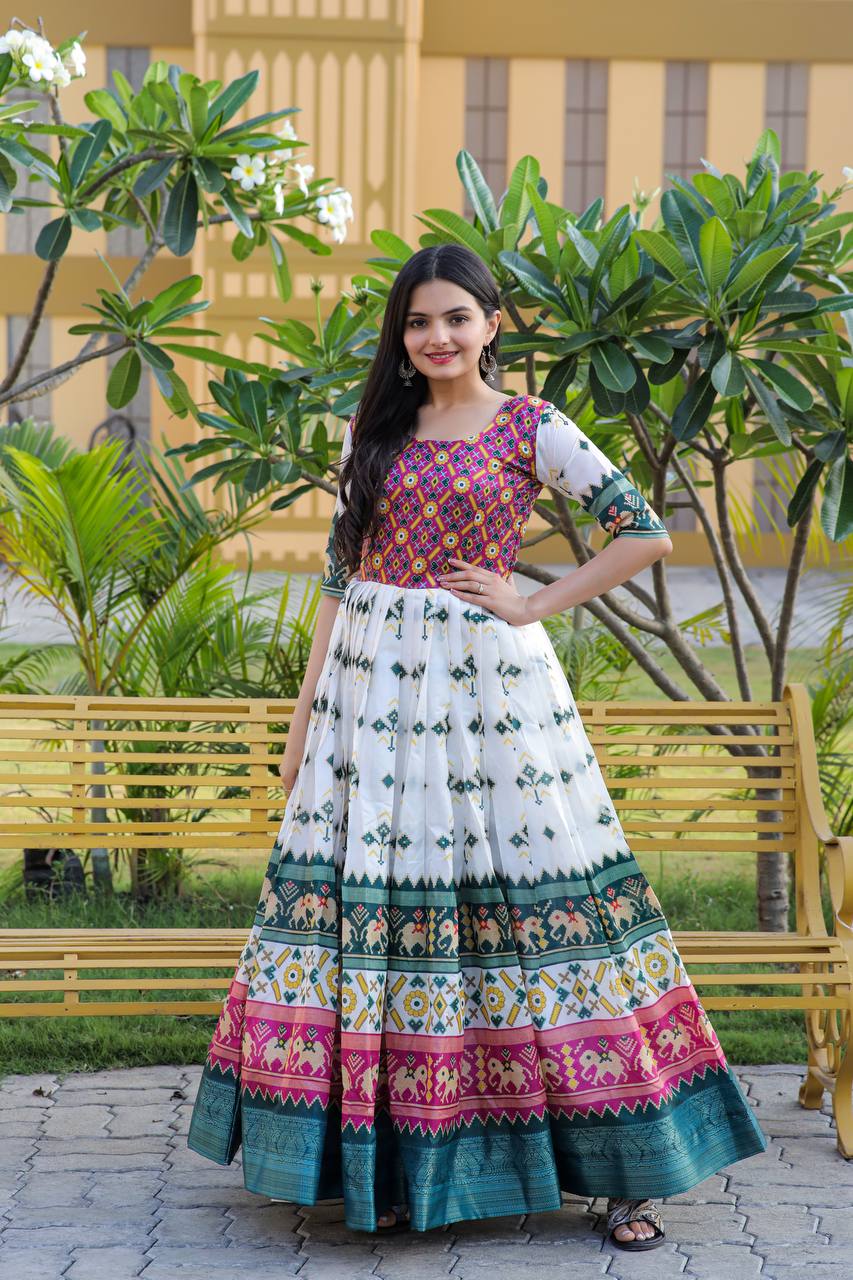 Precious White Color With Green Print Patola Silk Gown