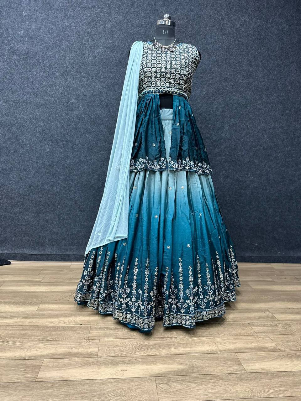 Decent Embroidery Sequence Sky Blue Lehenga With Top