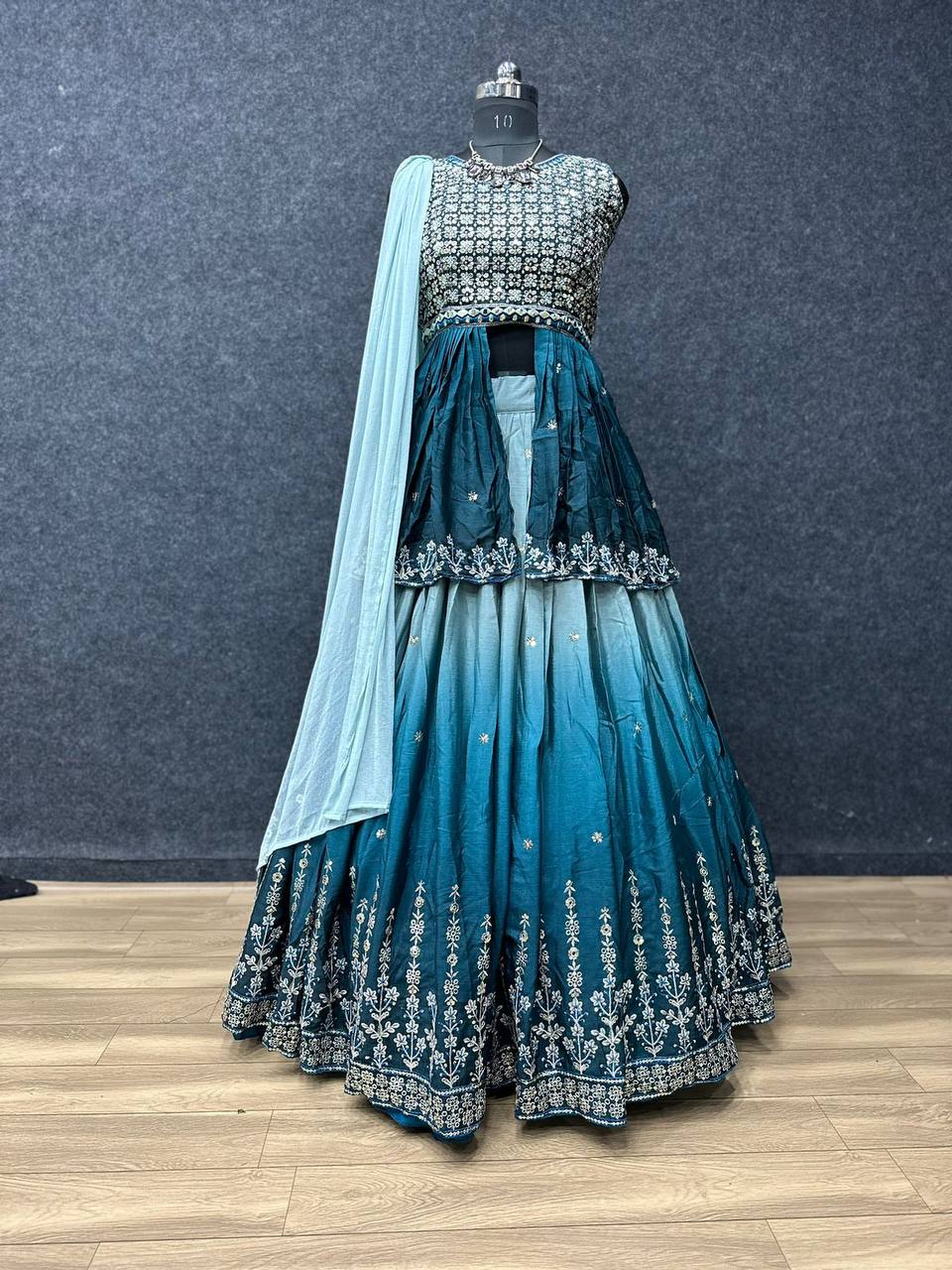 Decent Embroidery Sequence Sky Blue Lehenga With Top