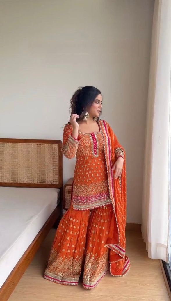 Ravishing Thread With Sequence Work Orange Color Sharara Suit