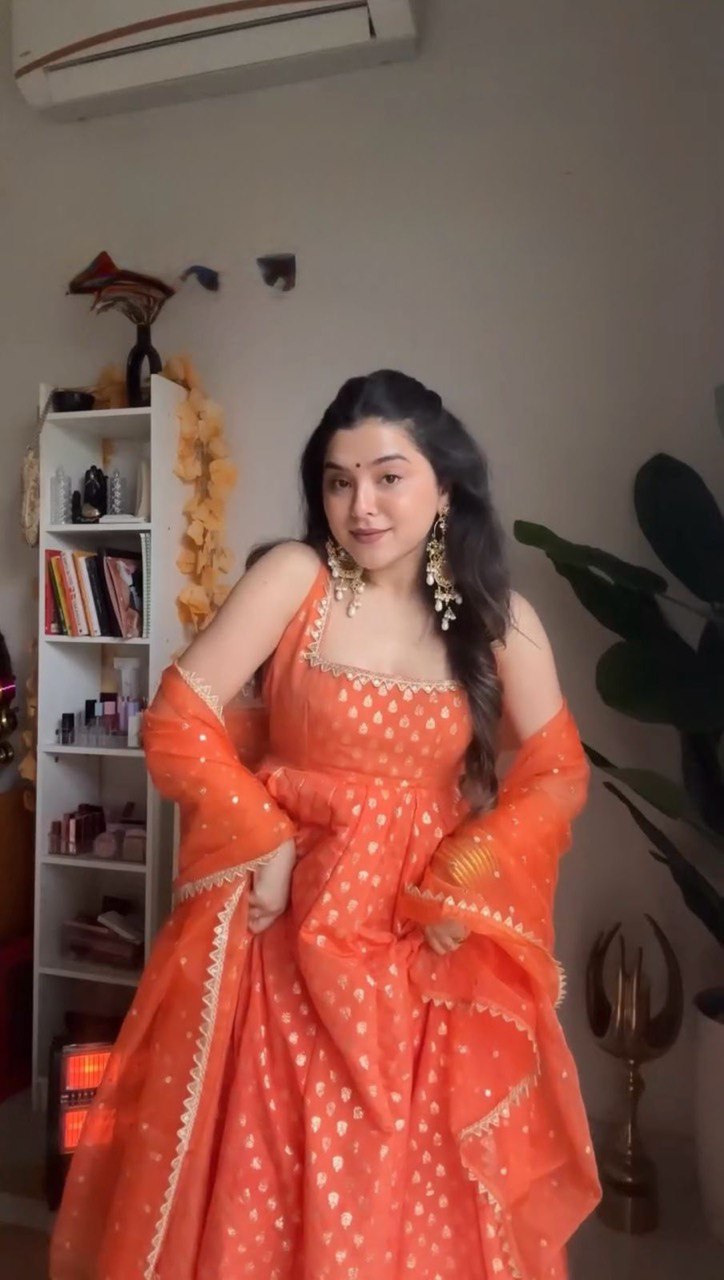 Stylish Jequard  Weaveing Orange Color Gown