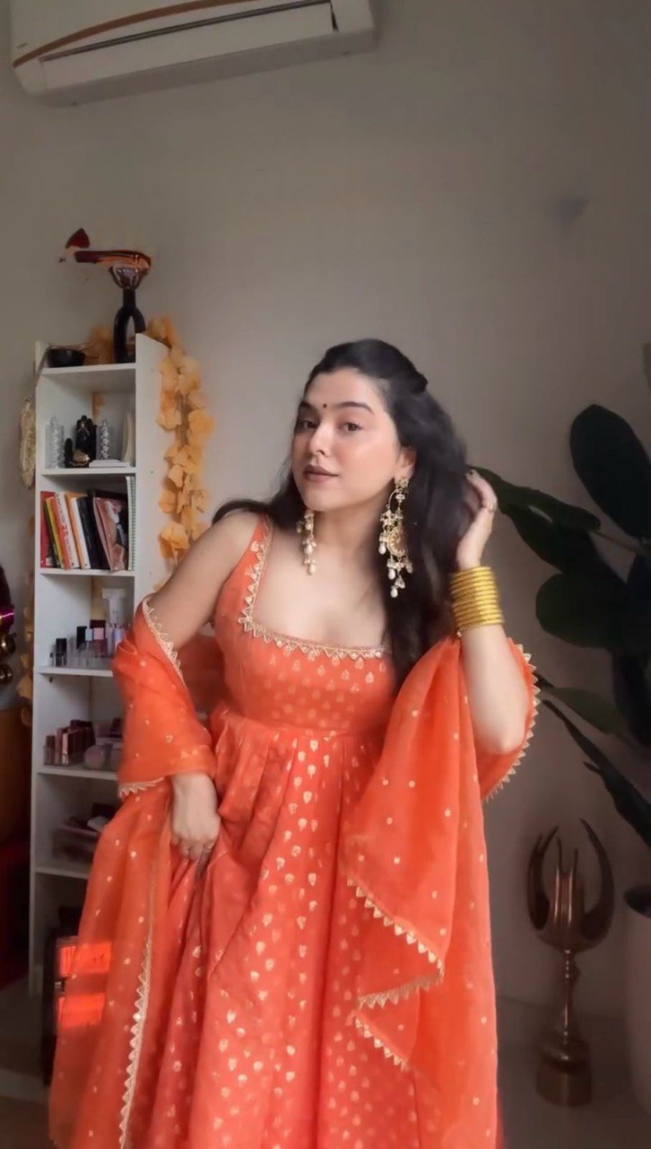 Stylish Jequard  Weaveing Orange Color Gown