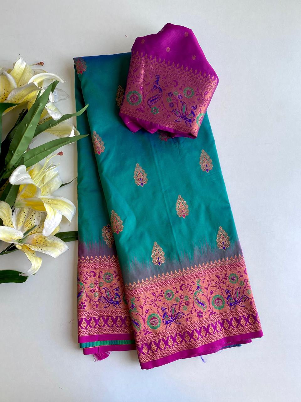 Ravishing Paithani Silk Teal Blue Color Zari Weaves Saree