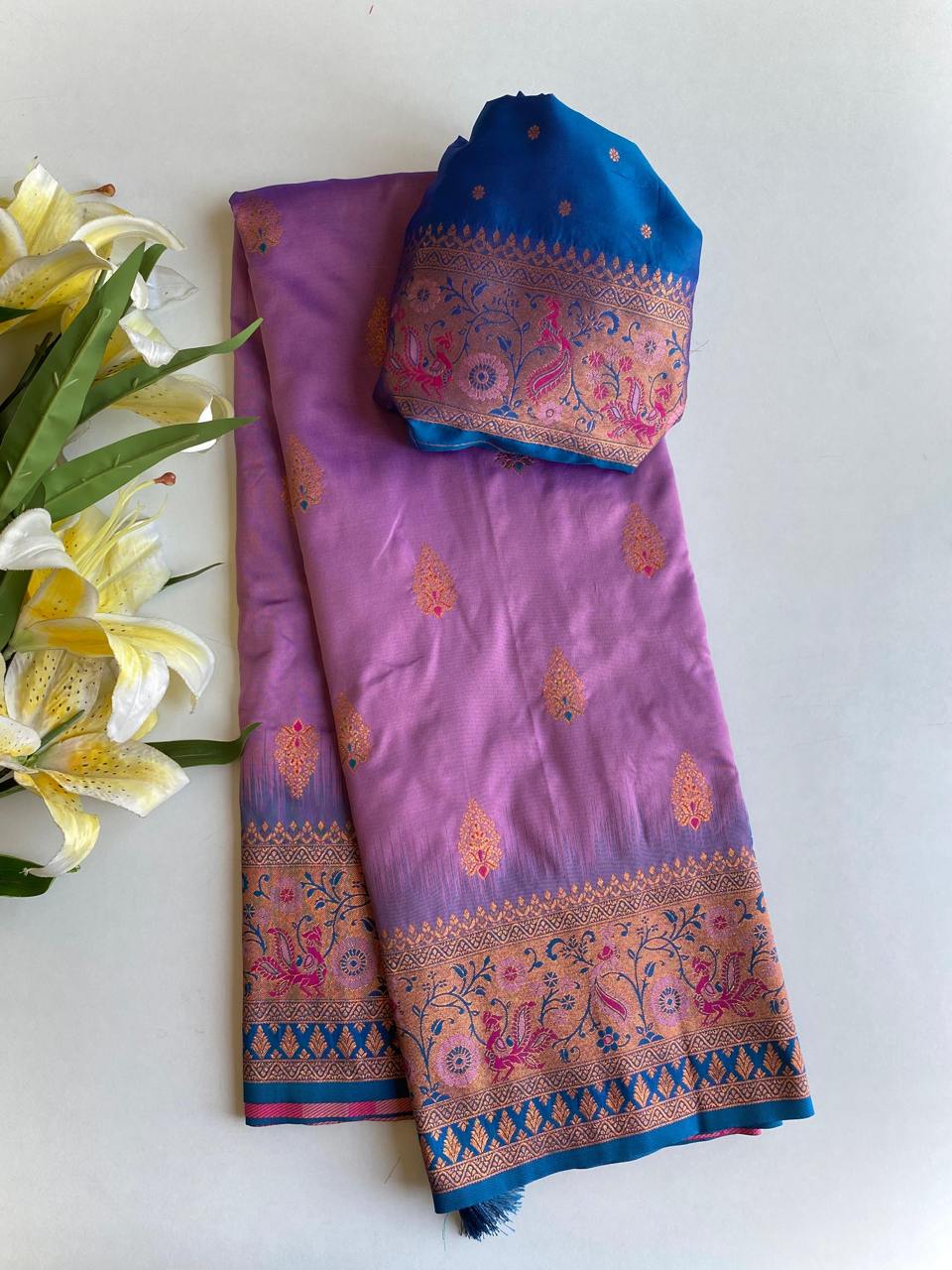 Ravishing Paithani Silk Lavender Color Zari Weaves Saree