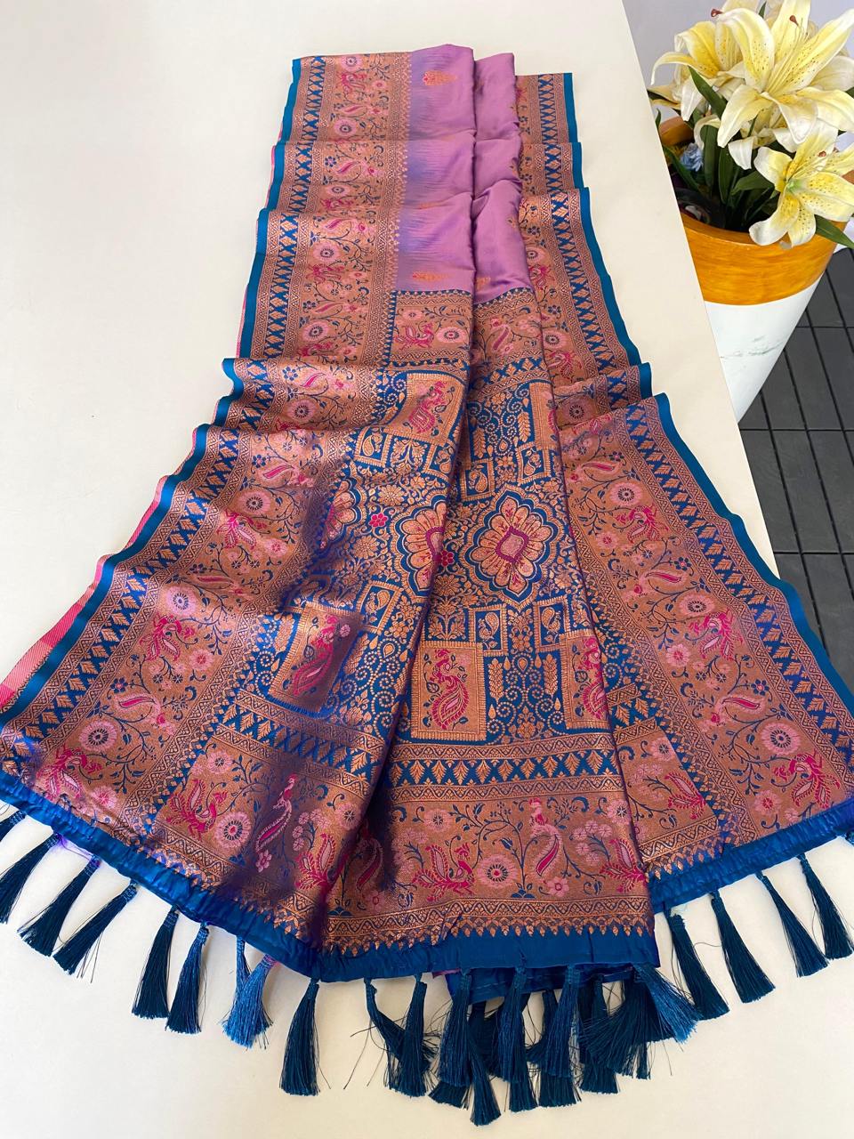 Ravishing Paithani Silk Lavender Color Zari Weaves Saree