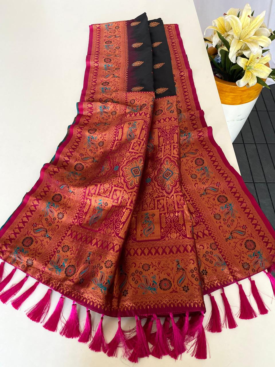 Ravishing Paithani Silk Black Color Zari Weaves Saree