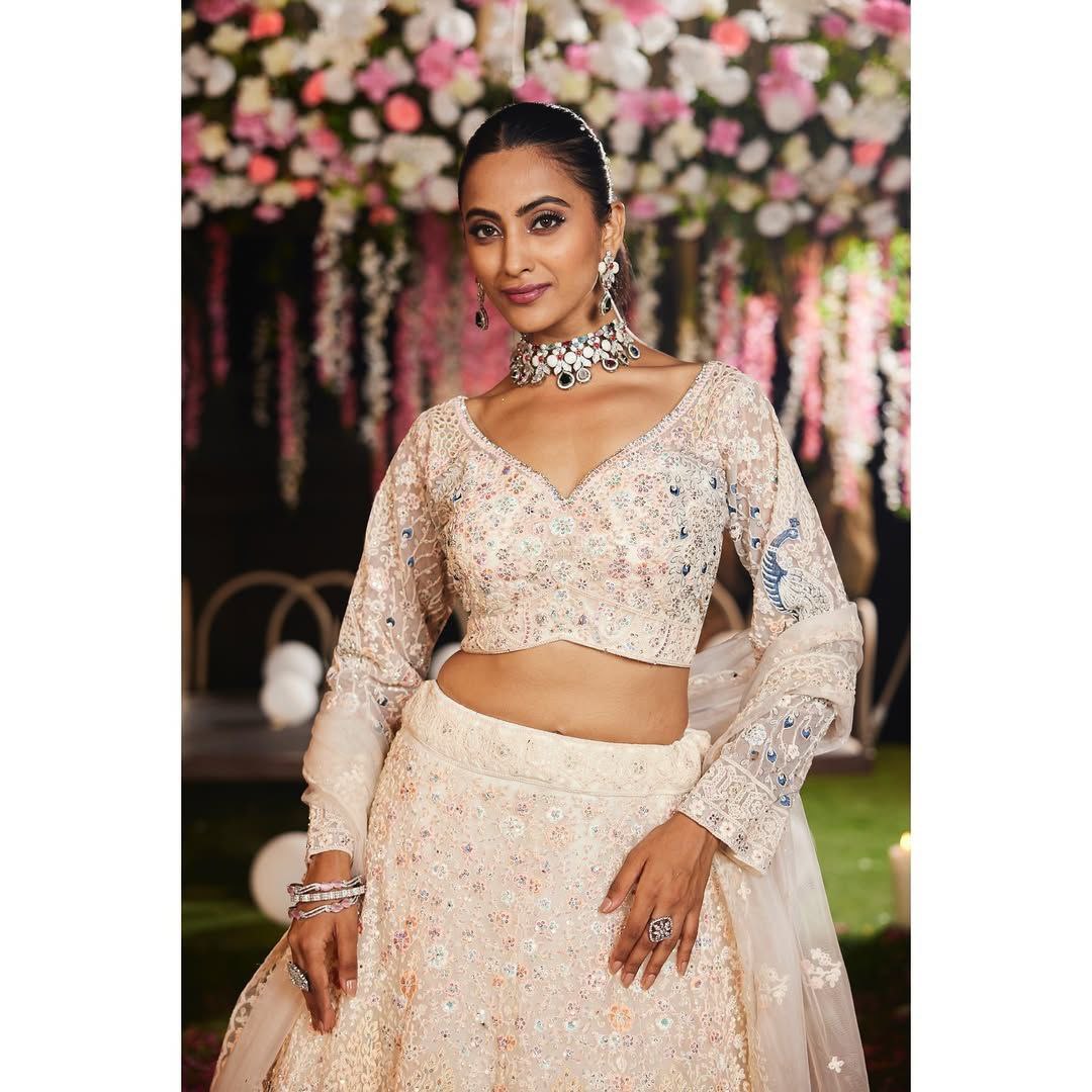 Bridal Wear Heavy Work Cream Color Lehenga Choli
