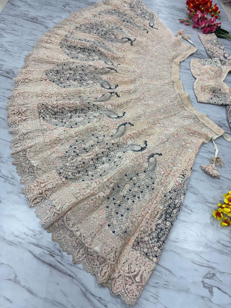 Bridal Wear Heavy Work Cream Color Lehenga Choli