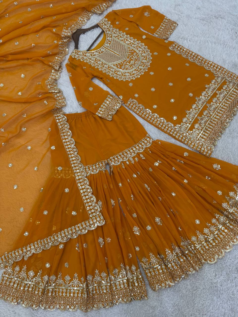 Admiring Heavy Mustard Color Sharara Suit