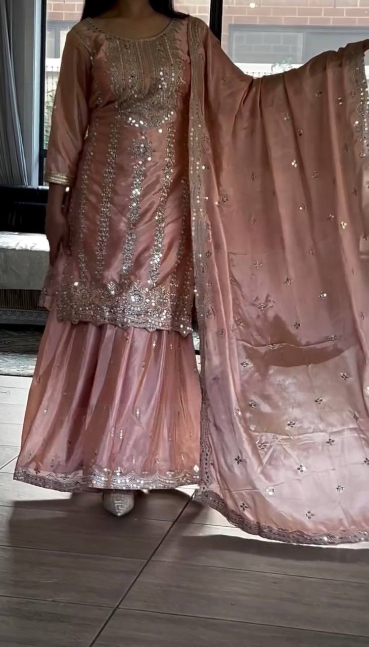 Demanding Embroidery Work Peach Color Sharara Suit