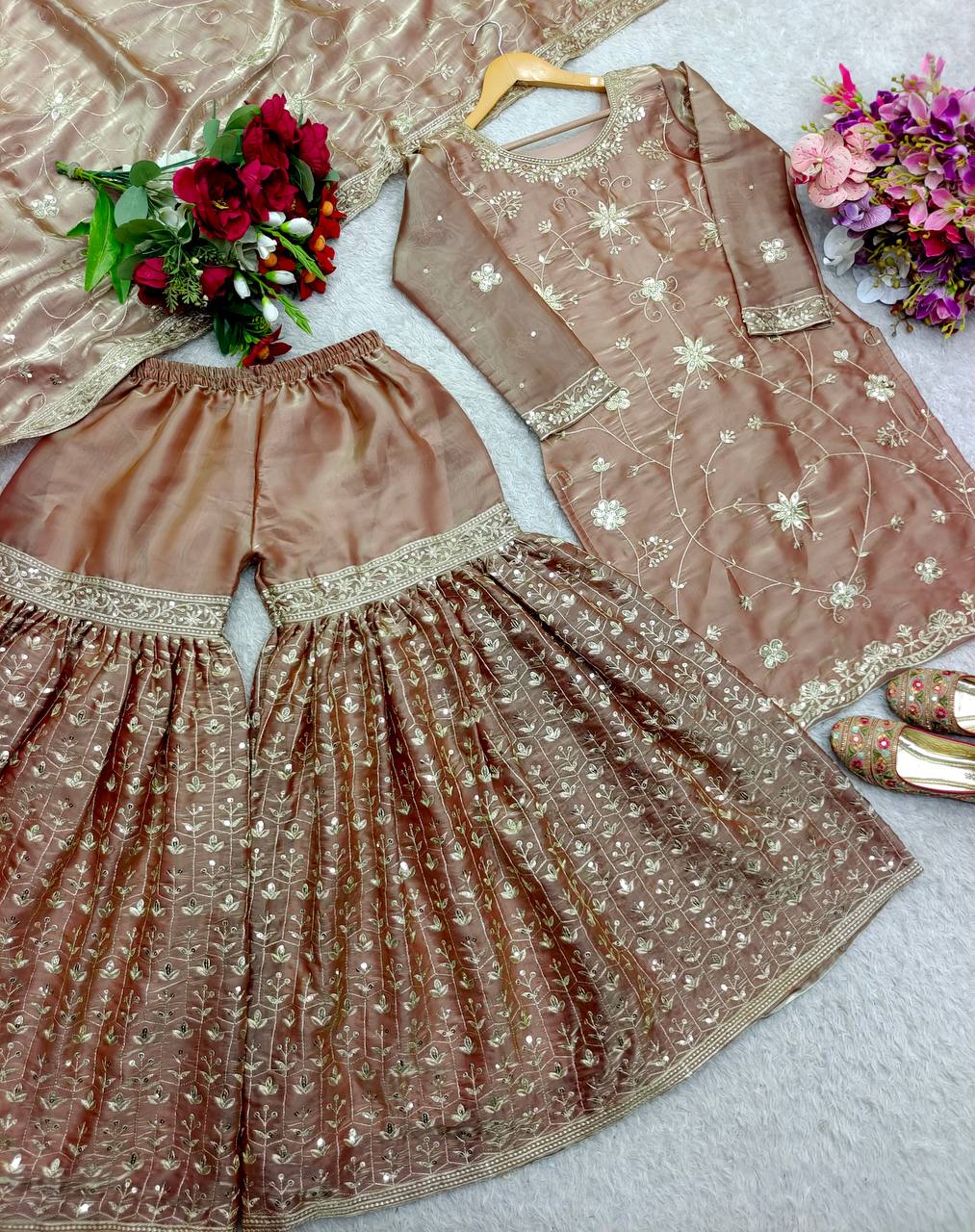 Preferable Heavy Work Peach Color Shining Sharara Suit