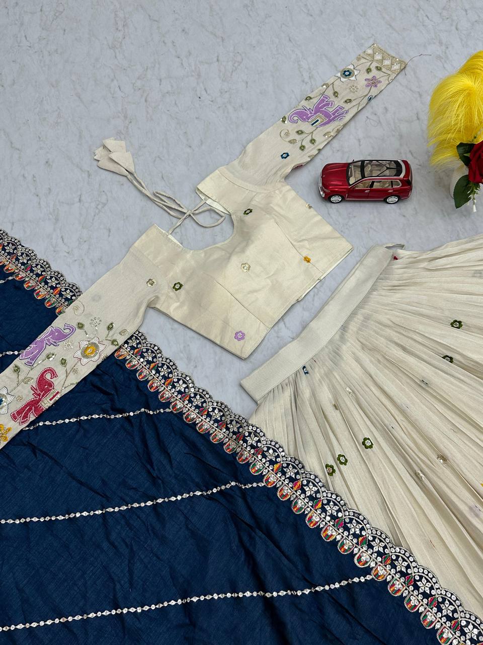 Stunning Off White Color Lehenga choli With Navy Blue Dupatta