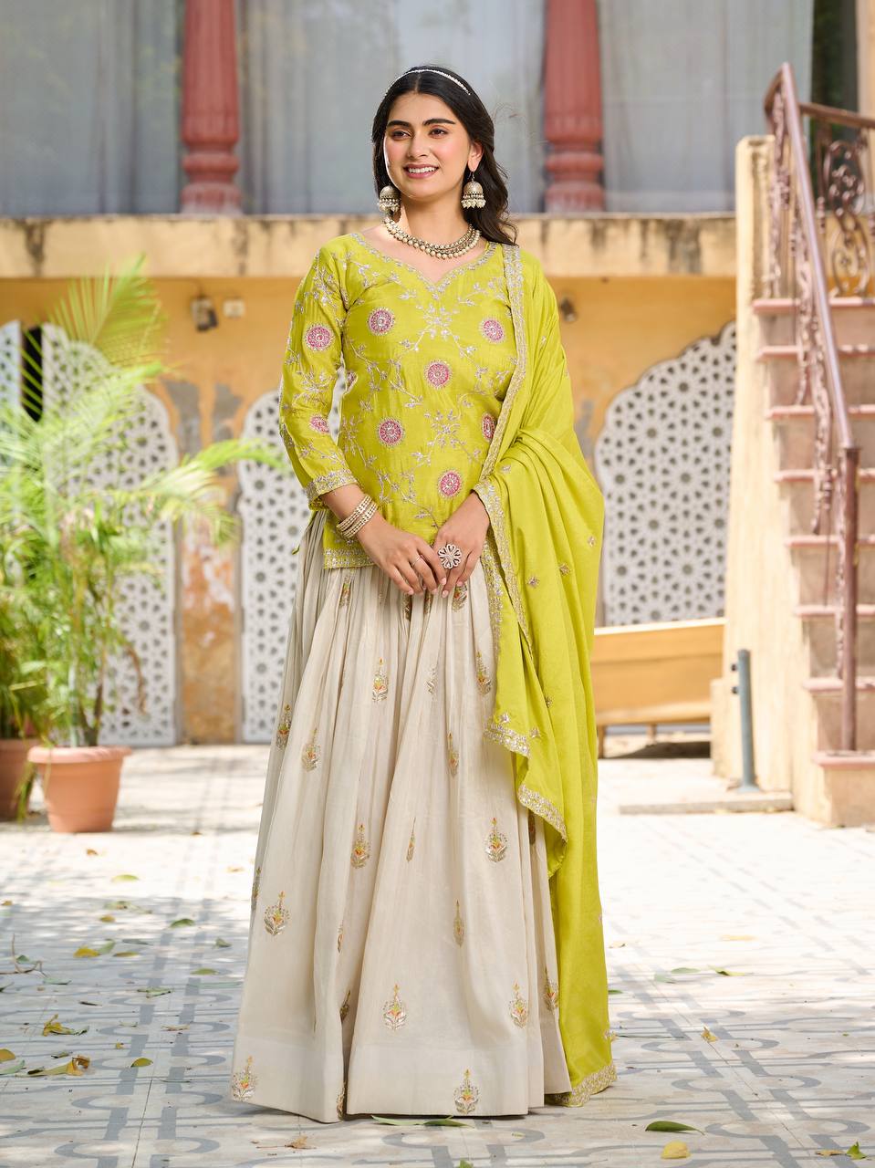 Occasion Wear Green Color Kurti With White Lehenga