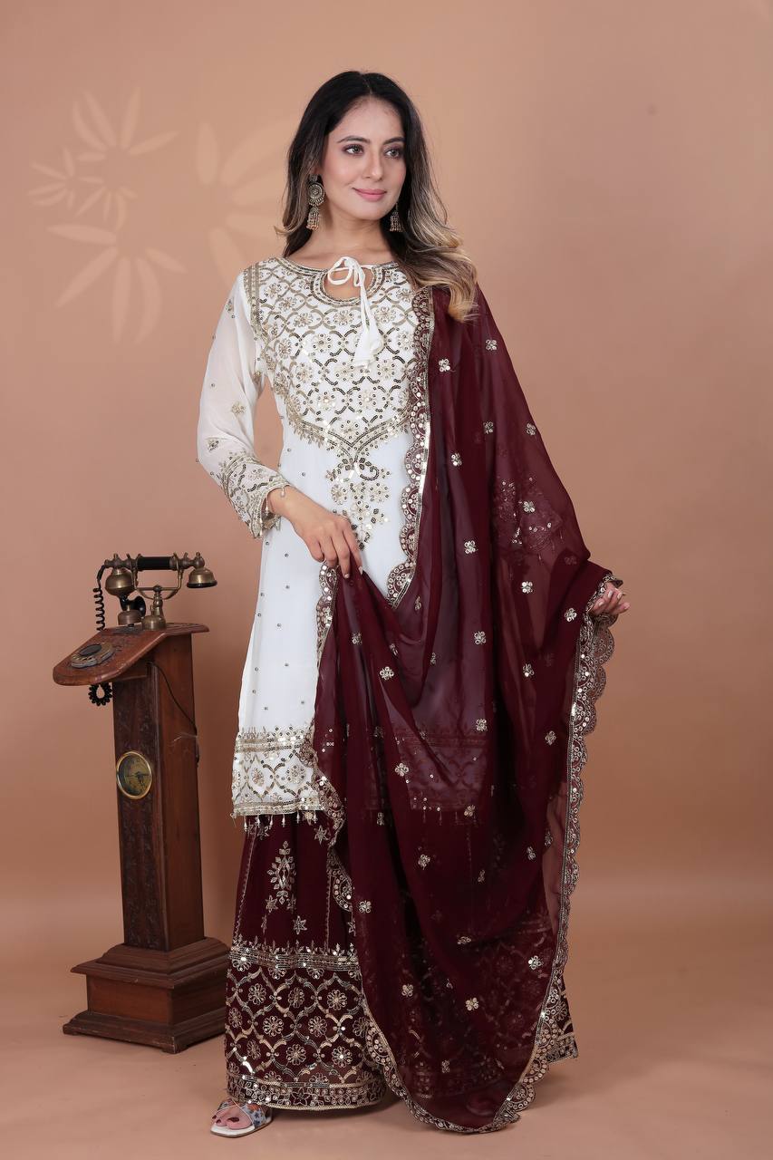 Fabulous Heavy Work White Color Suit With Maroon Sharara