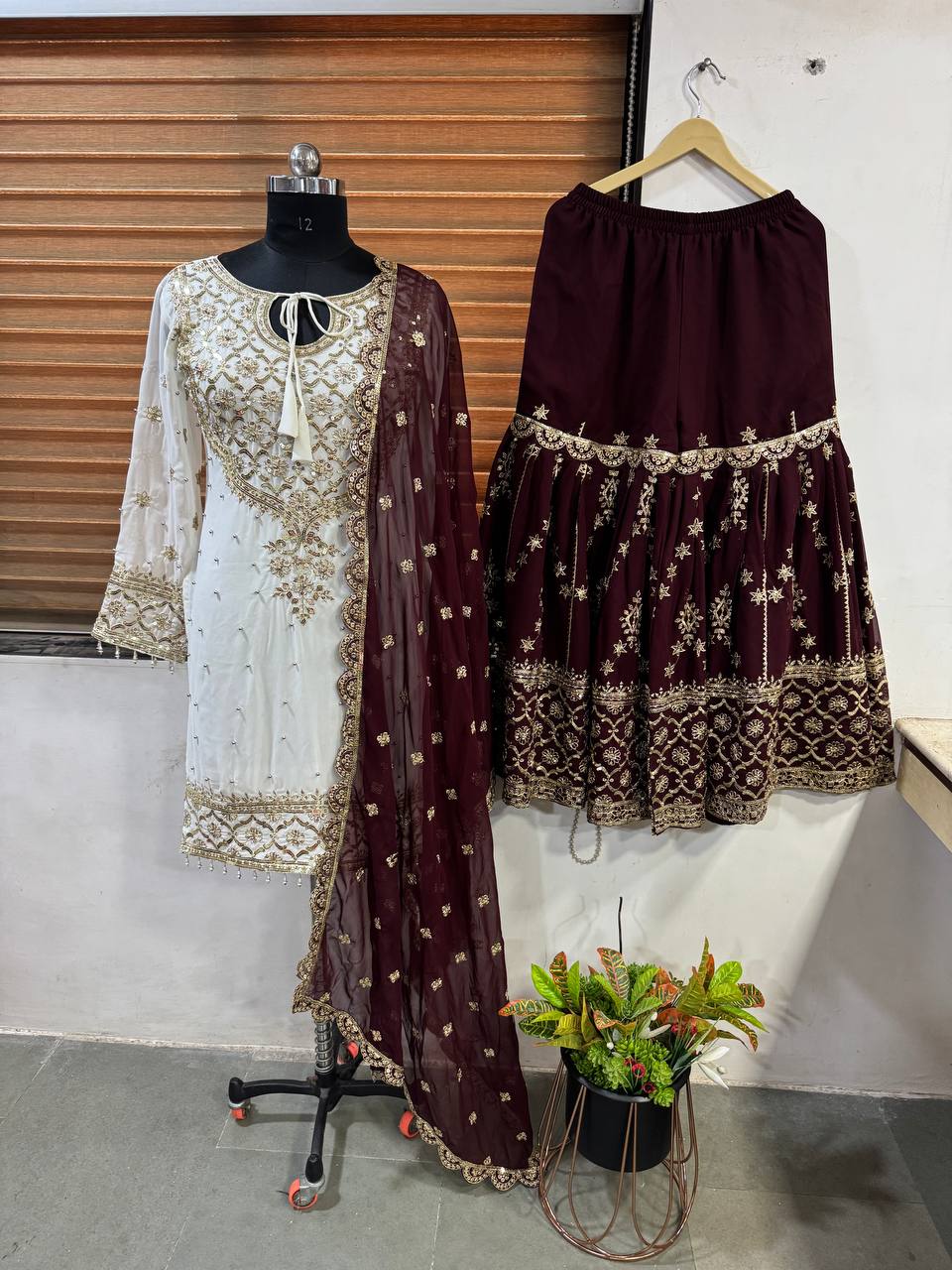 Fabulous Heavy Work White Color Suit With Maroon Sharara