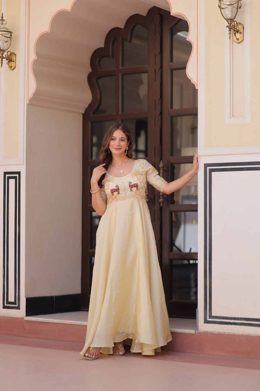 Fashionable Cream Color Embroidered Gown